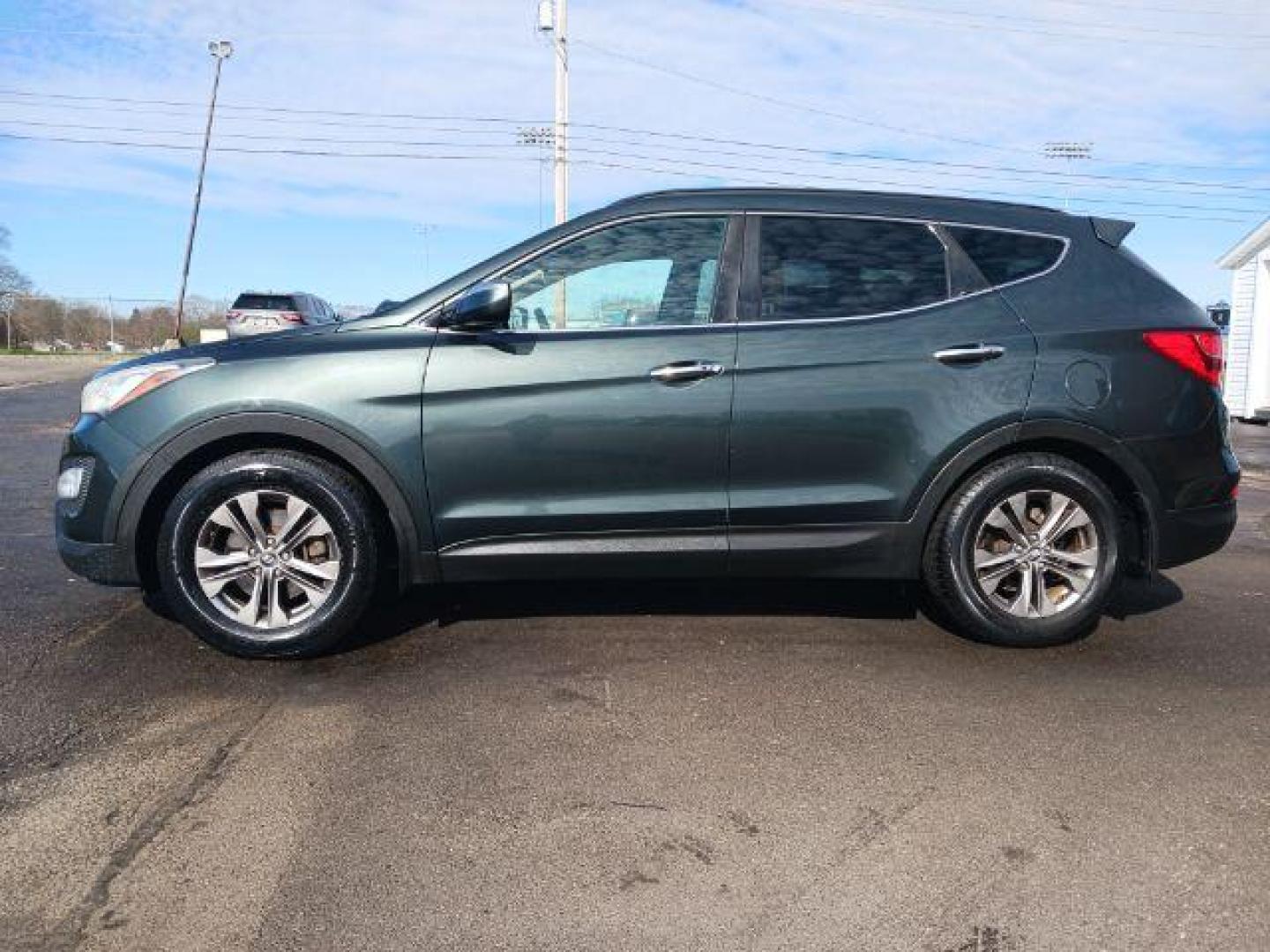 2013 Hyundai Santa Fe Sport 2.4 FWD (5XYZU3LB8DG) with an 2.4L L4 DOHC 16V engine, 6-Speed Automatic transmission, located at 1951 S Dayton Lakeview Rd., New Carlisle, OH, 45344, (937) 908-9800, 39.890999, -84.050255 - 2013 Hyundai Santa Fe Sport 2.4 FWD - Photo#3