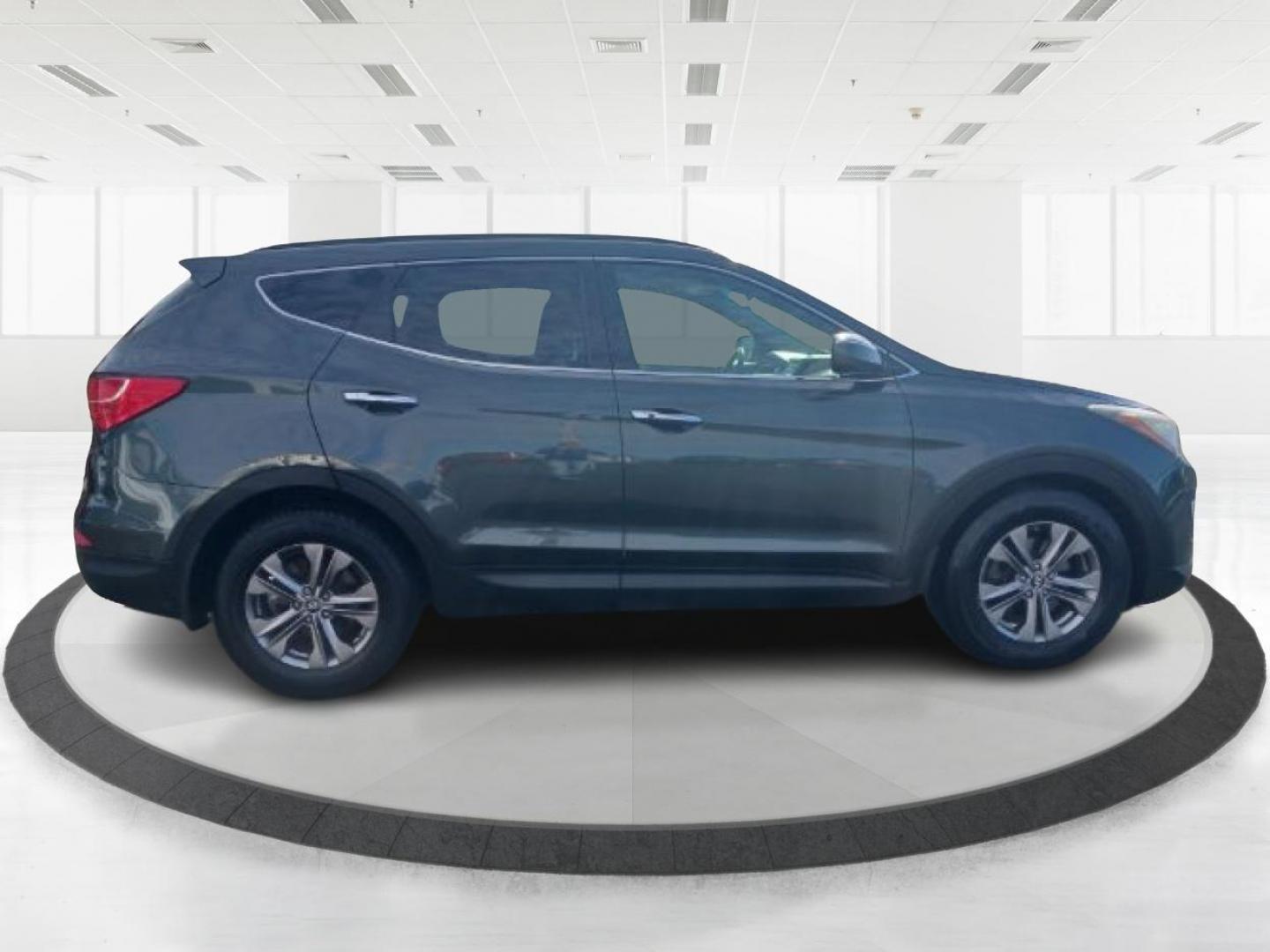 2013 Juniper Green Hyundai Santa Fe (5XYZU3LB8DG) with an 2.4L L4 DOHC 16V engine, 6-Speed Automatic transmission, located at 1230 East Main St, Xenia, OH, 45385, (937) 908-9800, 39.688026, -83.910172 - Photo#1