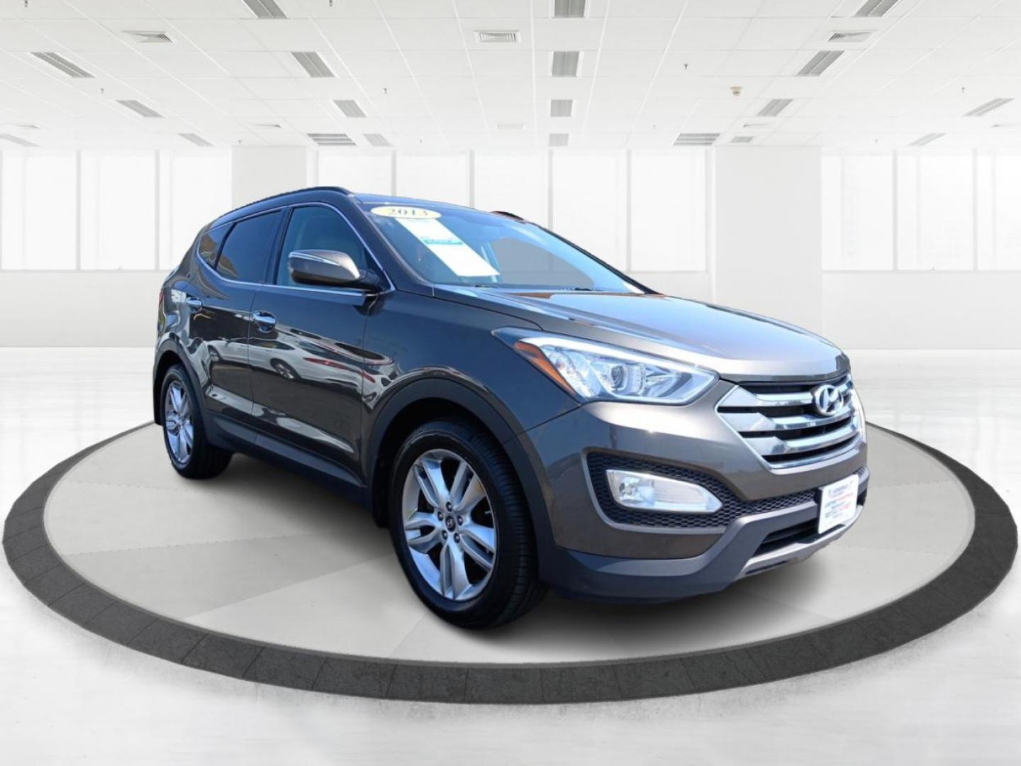 2013 Hyundai Santa Fe Sport 2.0 AWD (5XYZUDLA2DG) with an 2.0L L4 DOHC 16V engine, 6-Speed Automatic transmission, located at 401 Woodman Dr, Riverside, OH, 45431, (937) 908-9800, 39.760899, -84.123421 - 2013 Hyundai Santa Fe Sport 2.0 AWD - Photo#0