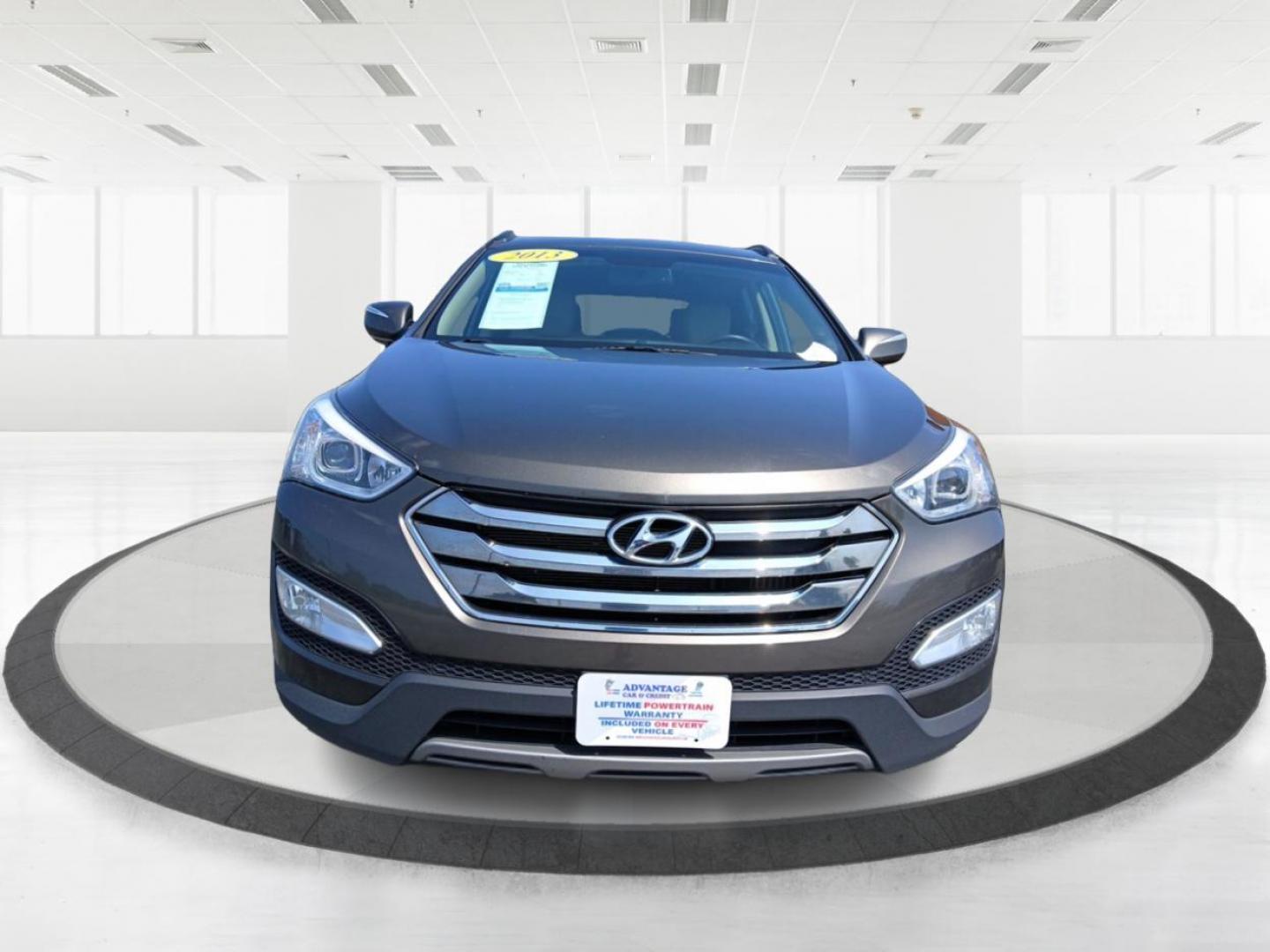 2013 Hyundai Santa Fe Sport 2.0 AWD (5XYZUDLA2DG) with an 2.0L L4 DOHC 16V engine, 6-Speed Automatic transmission, located at 401 Woodman Dr, Riverside, OH, 45431, (937) 908-9800, 39.760899, -84.123421 - 2013 Hyundai Santa Fe Sport 2.0 AWD - Photo#6