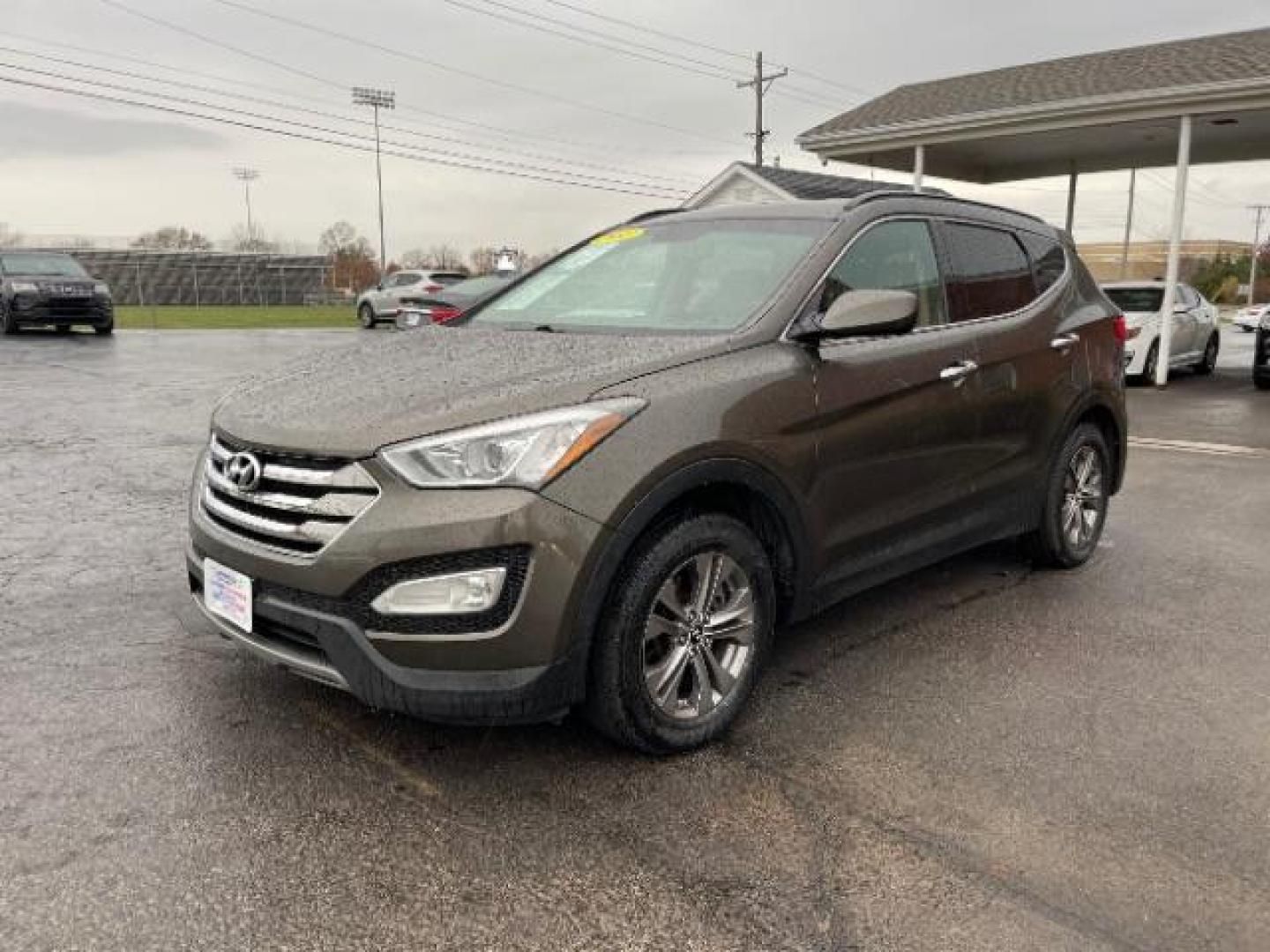 2013 Mineral Gray Hyundai Santa Fe Sport 2.4 AWD (5XYZUDLBXDG) with an 2.4L L4 DOHC 16V engine, 6-Speed Automatic transmission, located at 1230 East Main St, Xenia, OH, 45385, (937) 908-9800, 39.688026, -83.910172 - Photo#1