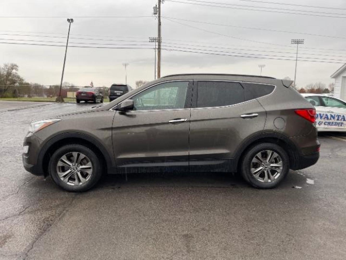 2013 Mineral Gray Hyundai Santa Fe Sport 2.4 AWD (5XYZUDLBXDG) with an 2.4L L4 DOHC 16V engine, 6-Speed Automatic transmission, located at 1230 East Main St, Xenia, OH, 45385, (937) 908-9800, 39.688026, -83.910172 - Photo#2