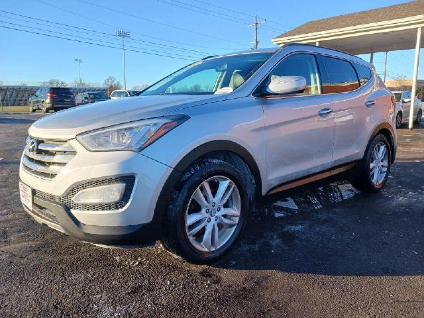 2013 Moonstone Silver Hyundai Santa Fe Sport 2.0 AWD (5XYZUDLA4DG) with an 2.0L L4 DOHC 16V engine, 6-Speed Automatic transmission, located at 1230 East Main St, Xenia, OH, 45385, (937) 908-9800, 39.688026, -83.910172 - Photo#2