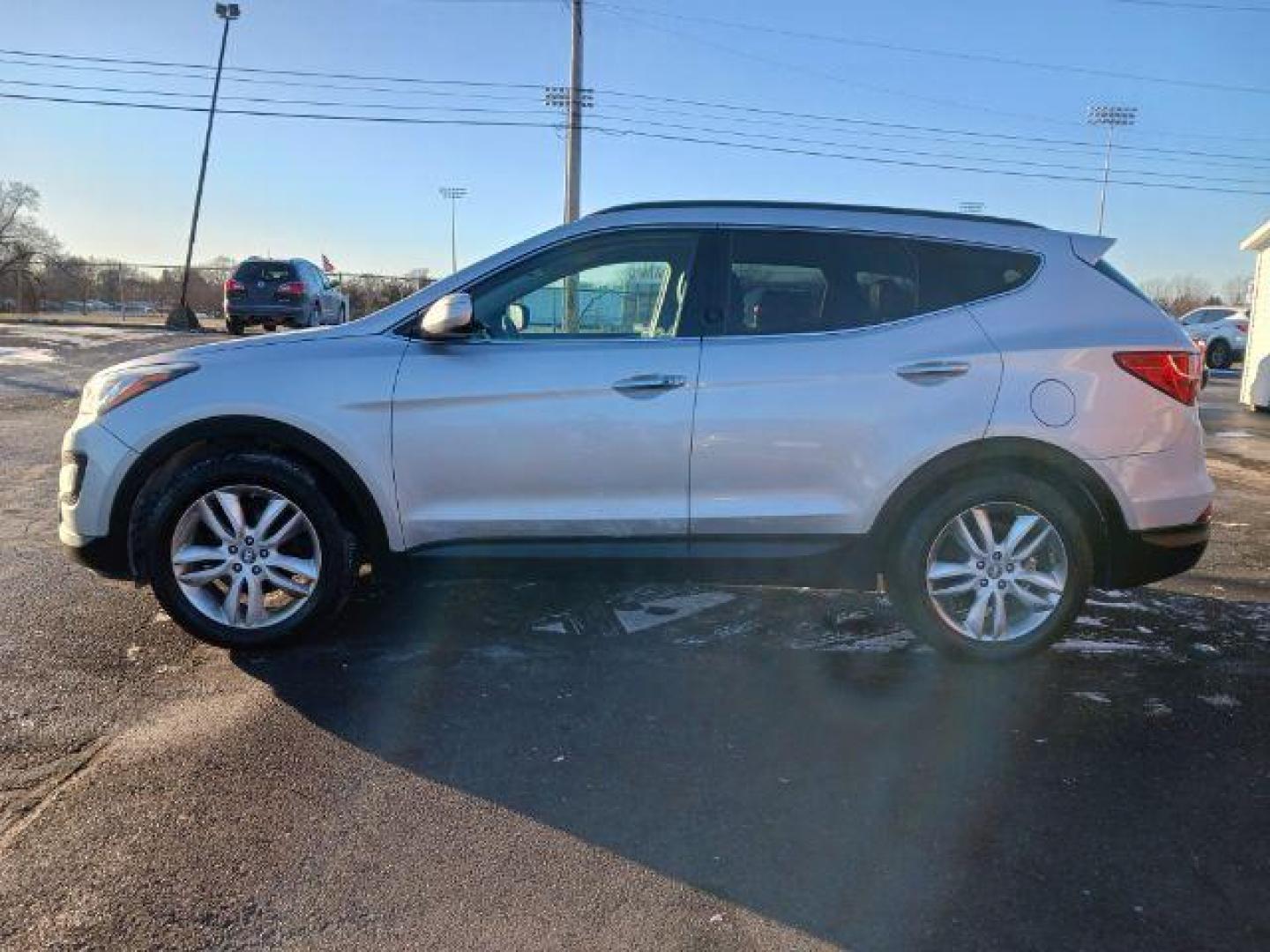 2013 Moonstone Silver Hyundai Santa Fe Sport 2.0 AWD (5XYZUDLA4DG) with an 2.0L L4 DOHC 16V engine, 6-Speed Automatic transmission, located at 1230 East Main St, Xenia, OH, 45385, (937) 908-9800, 39.688026, -83.910172 - Photo#3