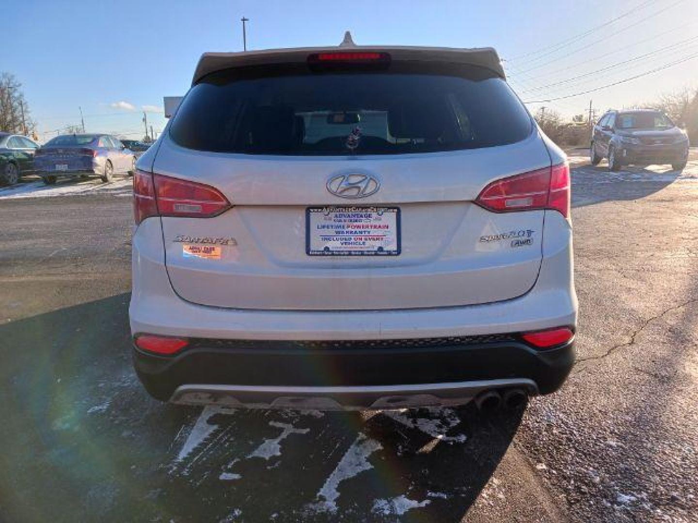 2013 Moonstone Silver Hyundai Santa Fe Sport 2.0 AWD (5XYZUDLA4DG) with an 2.0L L4 DOHC 16V engine, 6-Speed Automatic transmission, located at 1230 East Main St, Xenia, OH, 45385, (937) 908-9800, 39.688026, -83.910172 - Photo#5