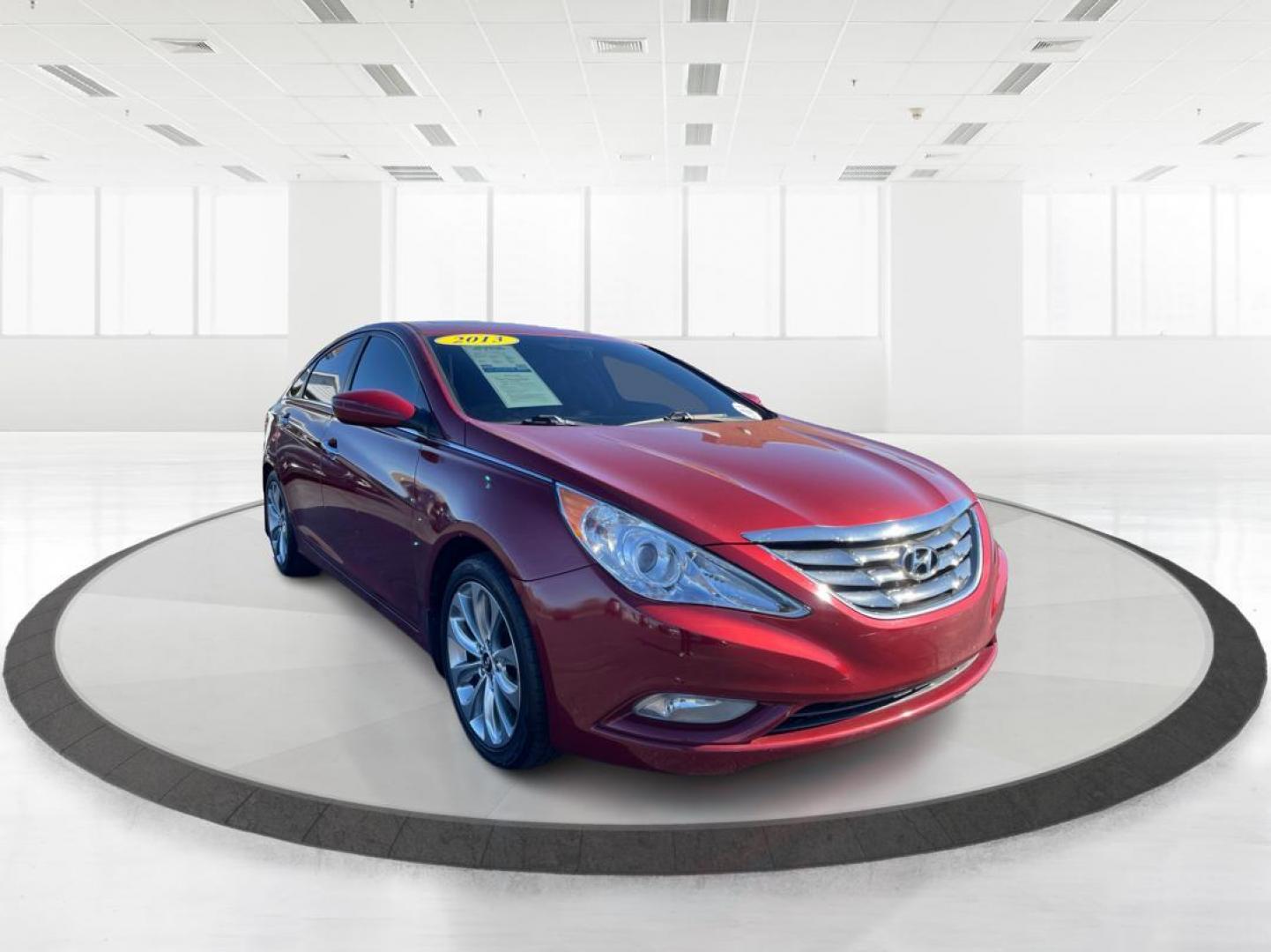 2013 Red Hyundai Sonata Limited Auto (5NPEC4AC7DH) with an 2.4L L4 DOHC 16V engine, 6-Speed Automatic transmission, located at 880 E. National Road, Vandalia, OH, 45377, (937) 908-9800, 39.891918, -84.183594 - Photo#0