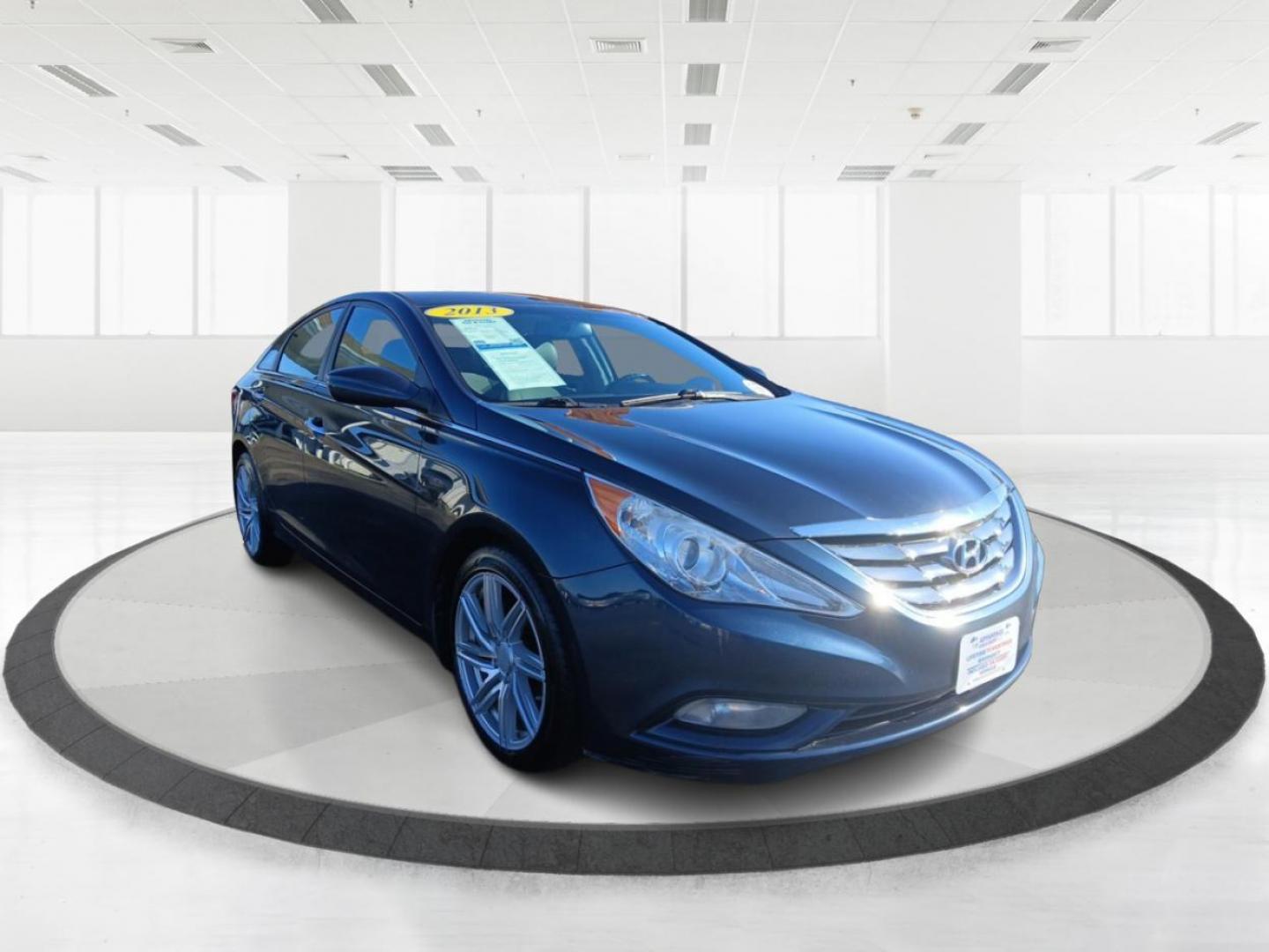 2013 Blue Hyundai Sonata Limited Auto (5NPEC4AC1DH) with an 2.4L L4 DOHC 16V engine, 6-Speed Automatic transmission, located at 8750 N County Rd 25A, Piqua, OH, 45356, (937) 908-9800, 40.164391, -84.232513 - Photo#0