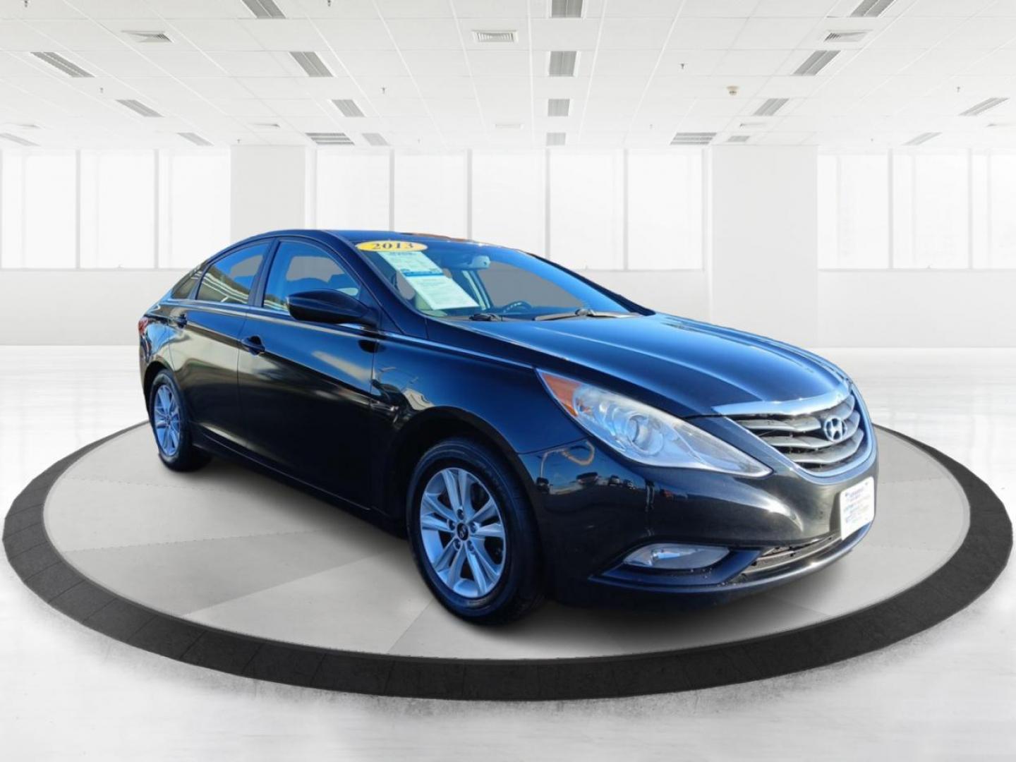 2013 Black Hyundai Sonata GLS (5NPEB4AC3DH) with an 2.4L L4 DOHC 16V engine, 6-Speed Automatic transmission, located at 880 E. National Road, Vandalia, OH, 45377, (937) 908-9800, 39.891918, -84.183594 - 2013 Hyundai Sonata GLS - Photo#0