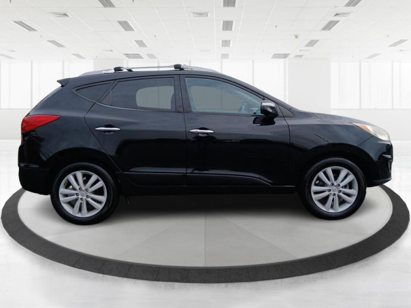 2013 Hyundai Tucson Limited 2WD (KM8JU3AC1DU) with an 2.4L L4 DOHC 16V engine, 6-Speed Automatic transmission, located at 1184 Kauffman Ave, Fairborn, OH, 45324, (937) 908-9800, 39.807072, -84.030914 - 2013 Hyundai Tucson Limited 2WD - Photo#1