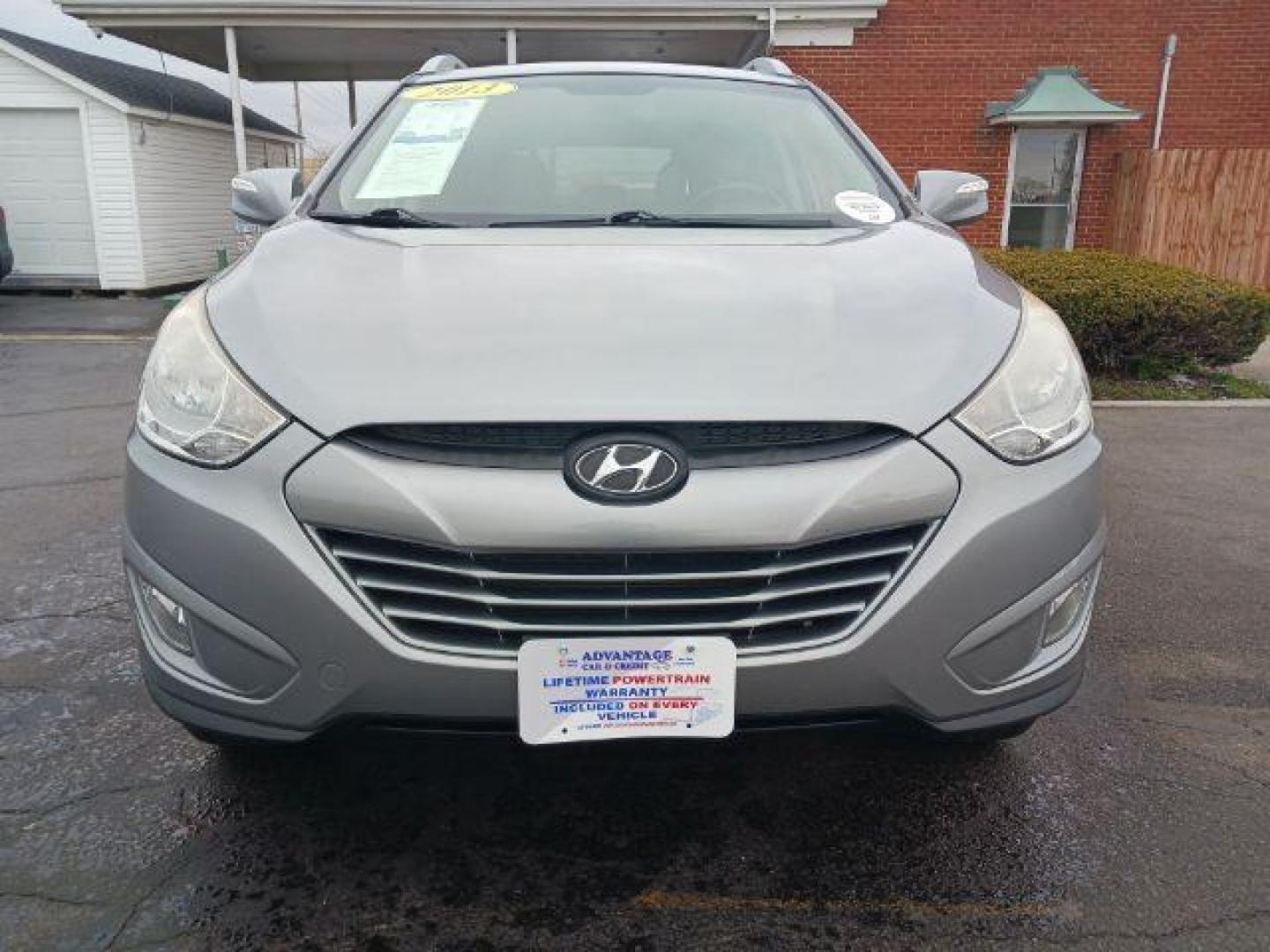 2013 Diamond Silver Metallic Hyundai Tucson GLS AWD (KM8JUCAC2DU) with an 2.4L L4 DOHC 16V engine, 6-Speed Automatic transmission, located at 401 Woodman Dr, Riverside, OH, 45431, (937) 908-9800, 39.760899, -84.123421 - Photo#1