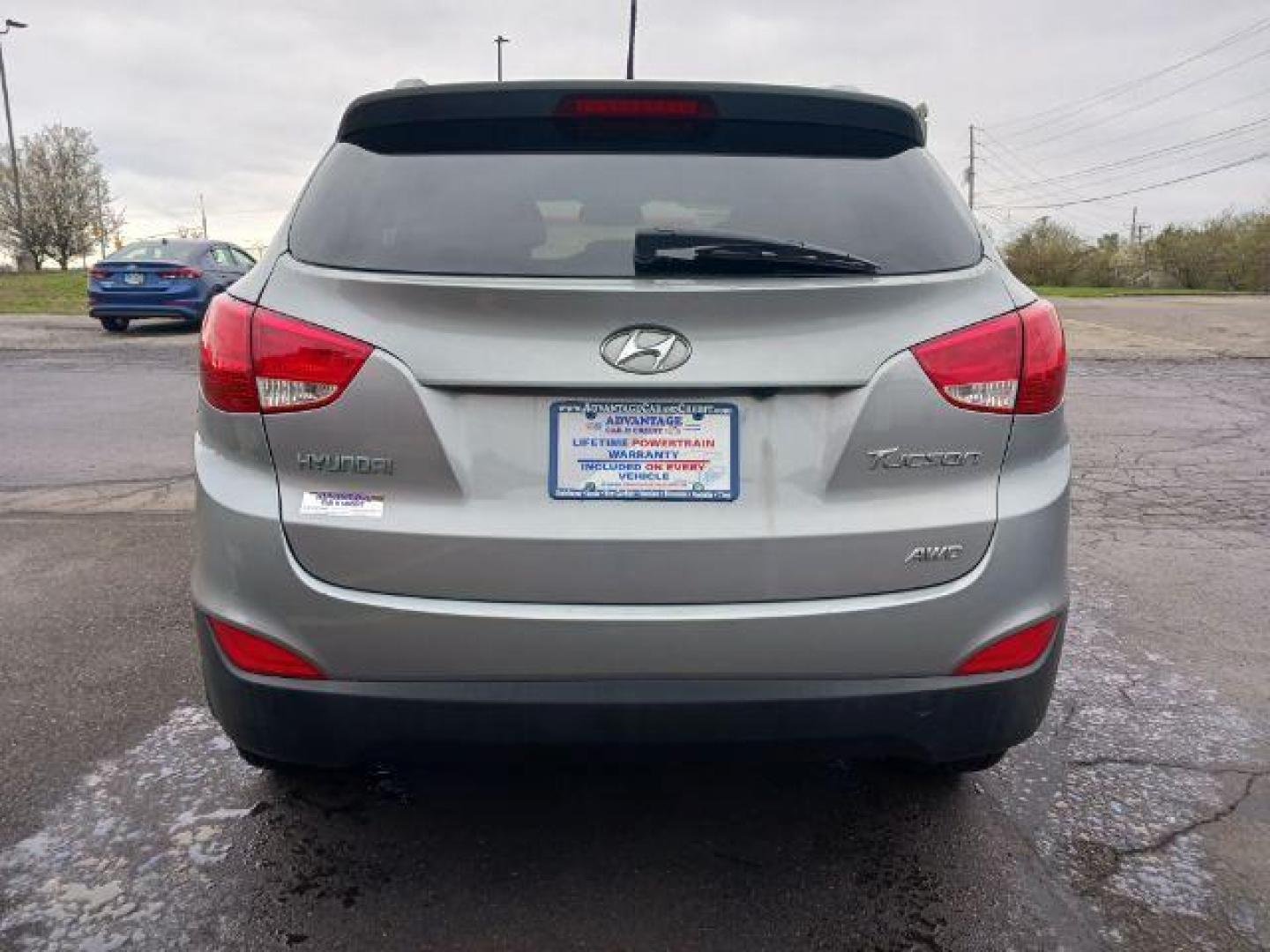 2013 Diamond Silver Metallic Hyundai Tucson GLS AWD (KM8JUCAC2DU) with an 2.4L L4 DOHC 16V engine, 6-Speed Automatic transmission, located at 401 Woodman Dr, Riverside, OH, 45431, (937) 908-9800, 39.760899, -84.123421 - Photo#5