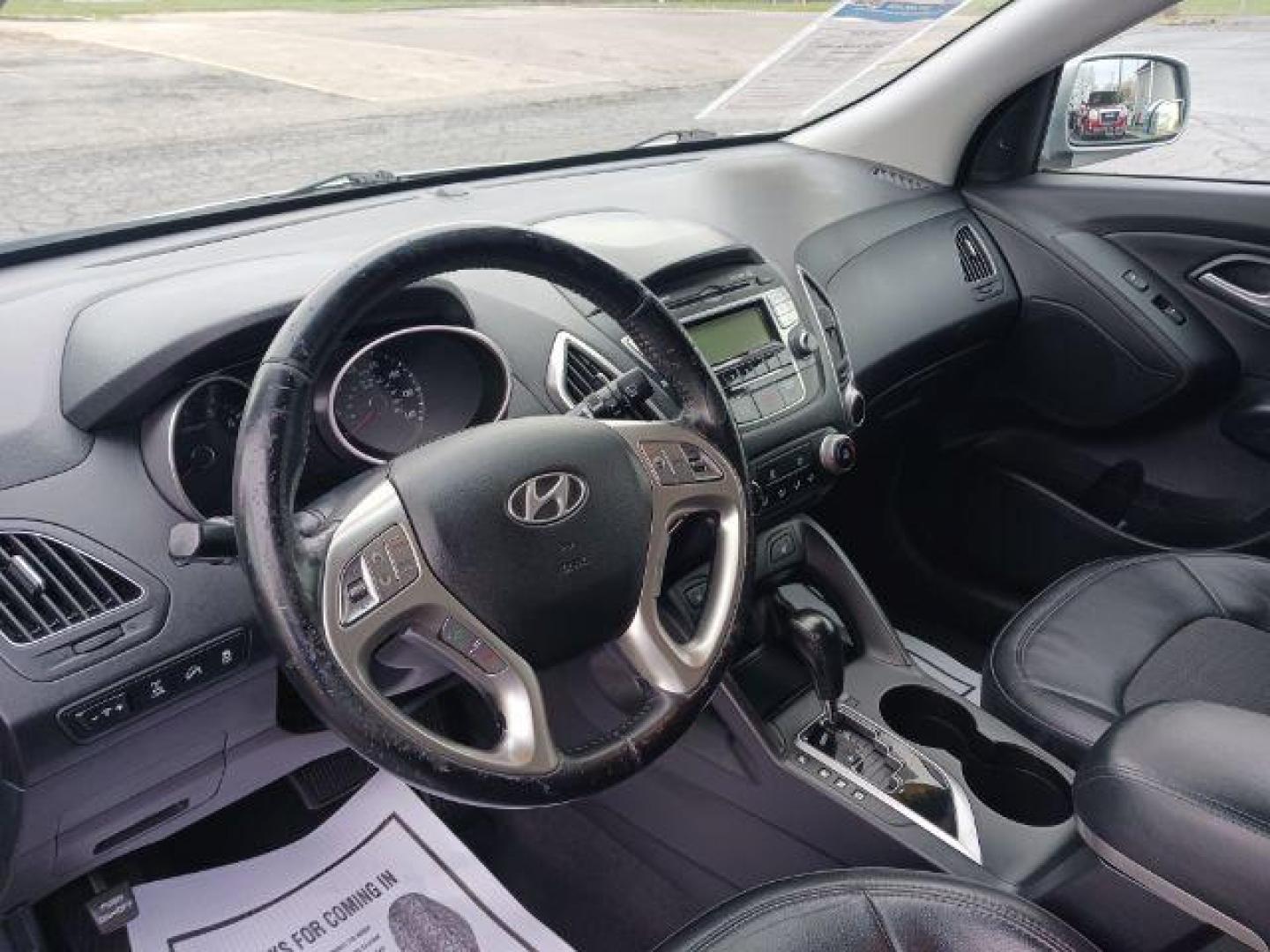 2013 Diamond Silver Metallic Hyundai Tucson GLS AWD (KM8JUCAC2DU) with an 2.4L L4 DOHC 16V engine, 6-Speed Automatic transmission, located at 401 Woodman Dr, Riverside, OH, 45431, (937) 908-9800, 39.760899, -84.123421 - Photo#6