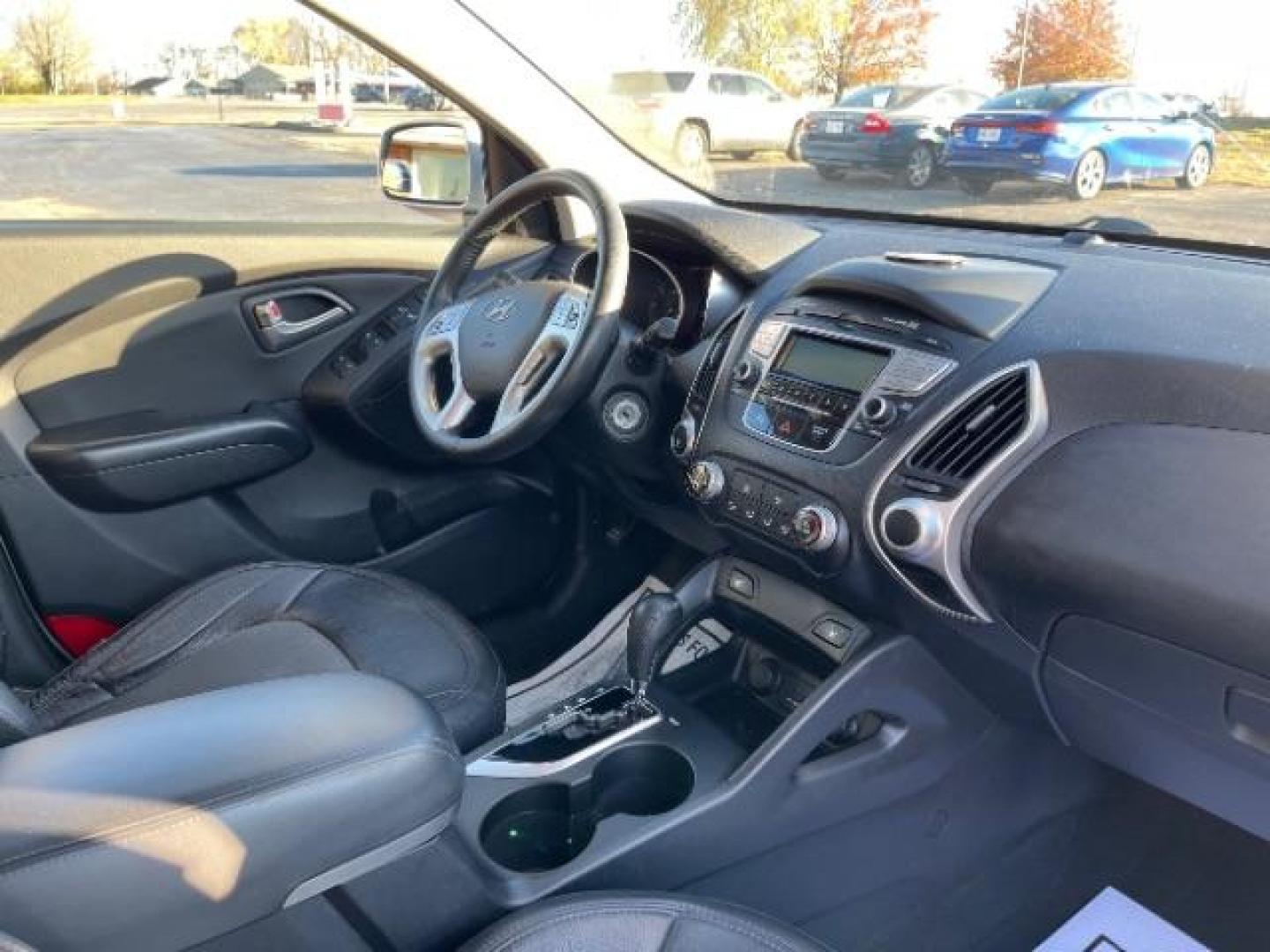 2013 Diamond Silver Metallic Hyundai Tucson GLS AWD (KM8JUCAC1DU) with an 2.4L L4 DOHC 16V engine, 6-Speed Automatic transmission, located at 1230 East Main St, Xenia, OH, 45385, (937) 908-9800, 39.688026, -83.910172 - Photo#8