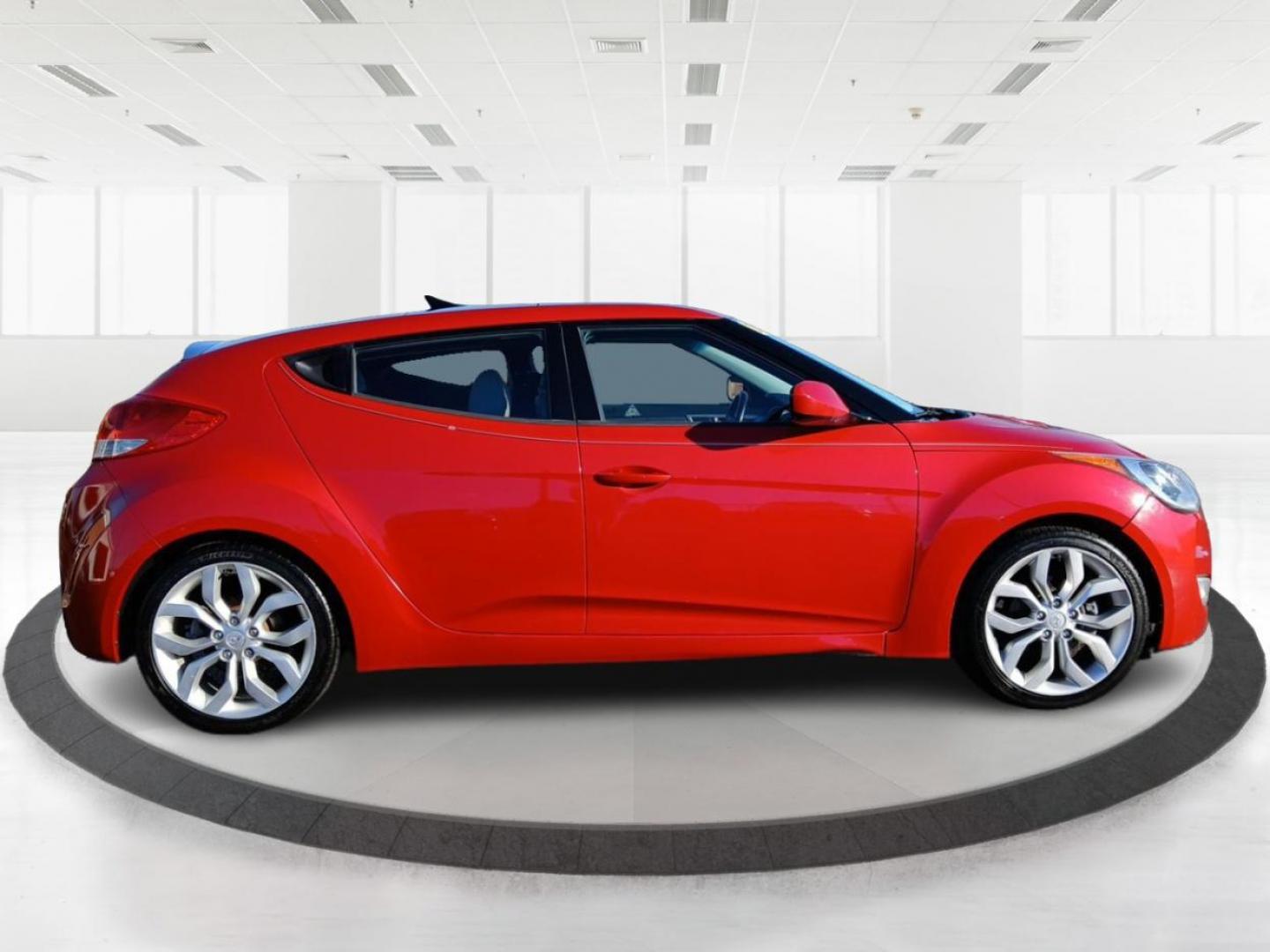 2013 Boston Red Metallic Hyundai Veloster Base (KMHTC6ADXDU) with an 1.6L L4 DOHC 16V engine, located at 401 Woodman Dr, Riverside, OH, 45431, (937) 908-9800, 39.760899, -84.123421 - Photo#1