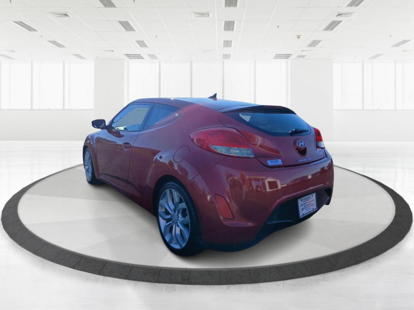 2013 Boston Red Metallic Hyundai Veloster Base (KMHTC6ADXDU) with an 1.6L L4 DOHC 16V engine, located at 401 Woodman Dr, Riverside, OH, 45431, (937) 908-9800, 39.760899, -84.123421 - Photo#4