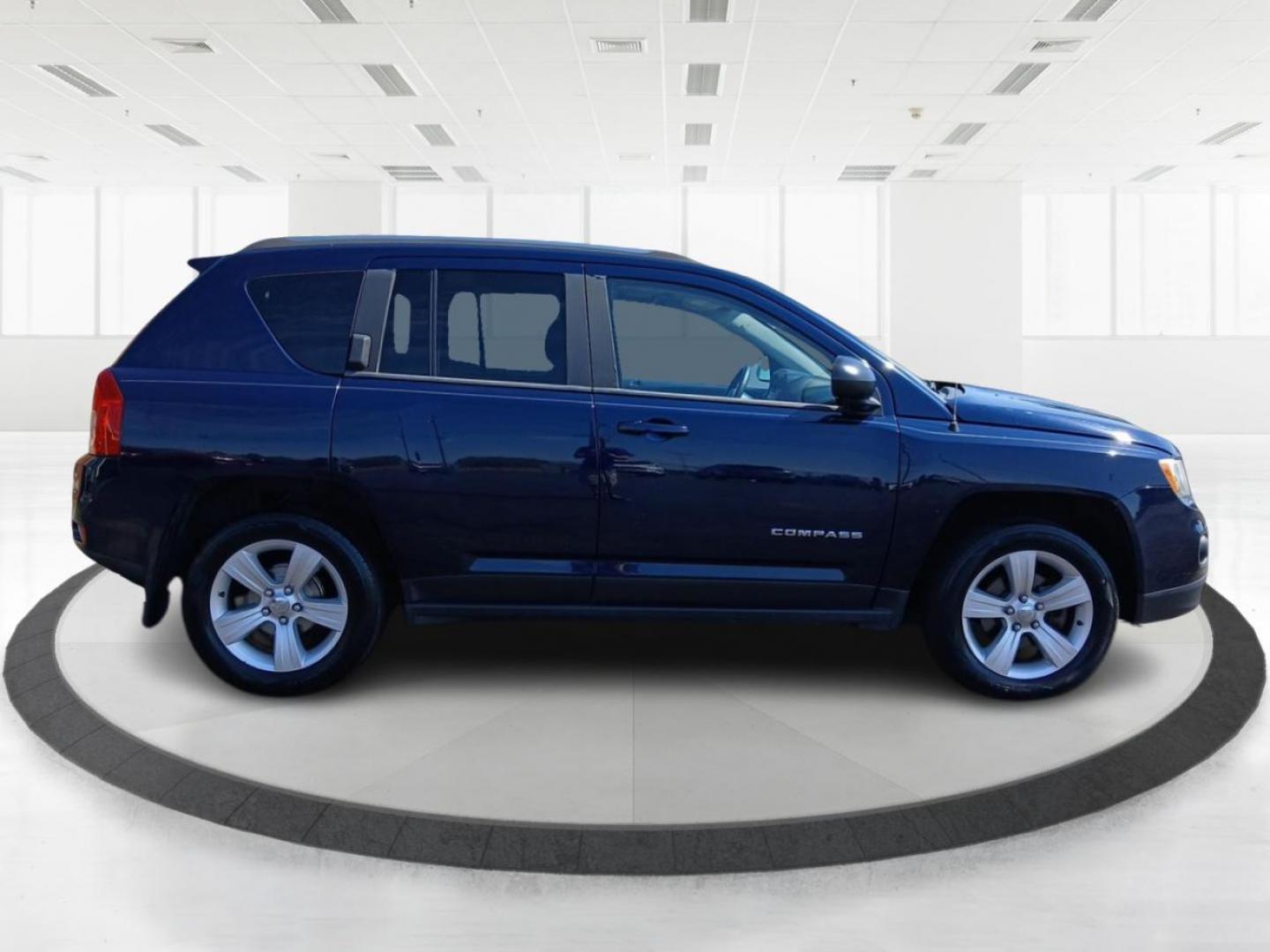 2013 True Blue Pearlcoat Jeep Compass Latitude FWD (1C4NJCEB0DD) with an 2.4L L4 DOHC 16V engine, Continuously Variable Transmission transmission, located at 401 Woodman Dr, Riverside, OH, 45431, (937) 908-9800, 39.760899, -84.123421 - Photo#1