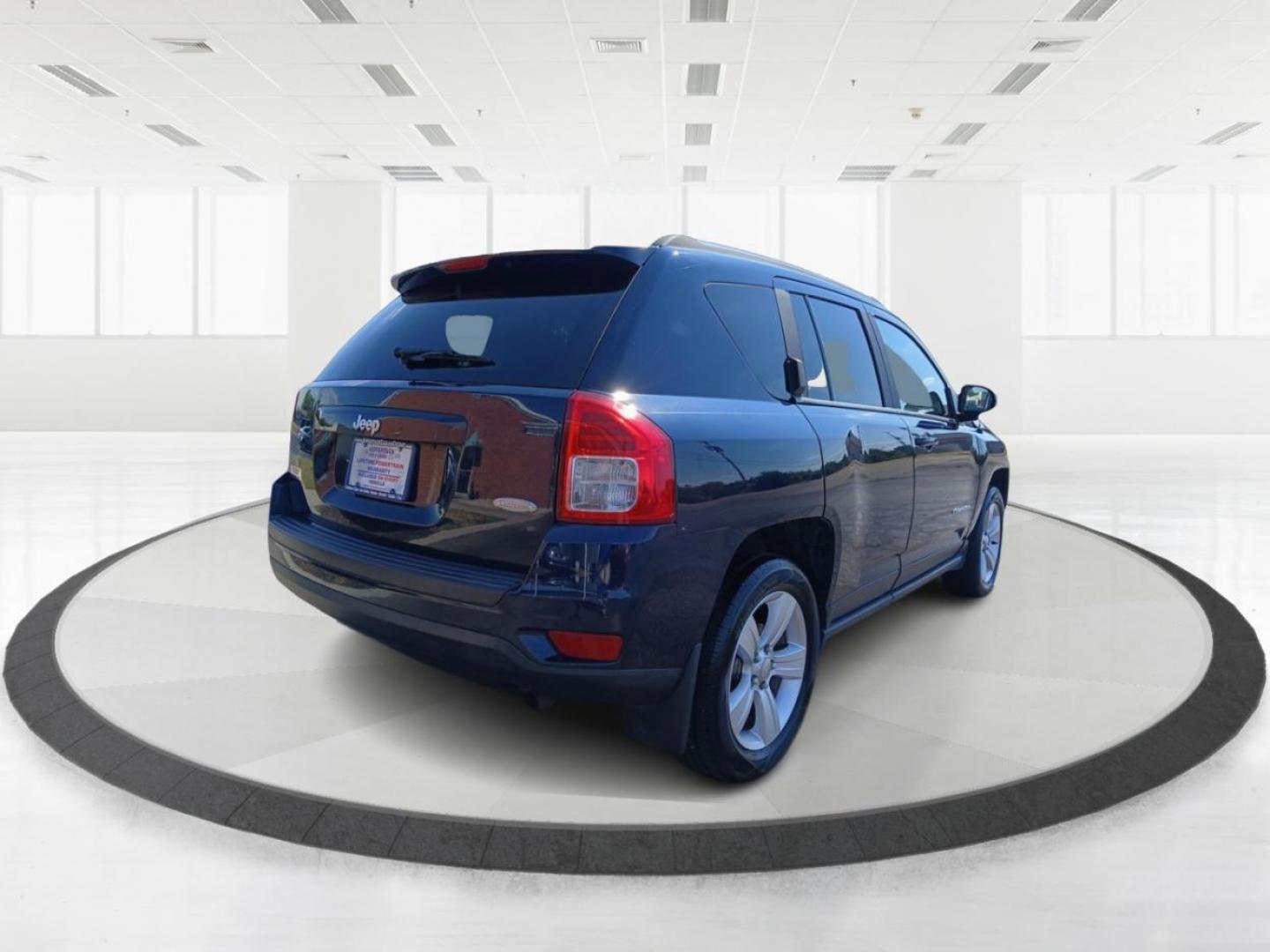 2013 True Blue Pearlcoat Jeep Compass Latitude FWD (1C4NJCEB0DD) with an 2.4L L4 DOHC 16V engine, Continuously Variable Transmission transmission, located at 401 Woodman Dr, Riverside, OH, 45431, (937) 908-9800, 39.760899, -84.123421 - Photo#2