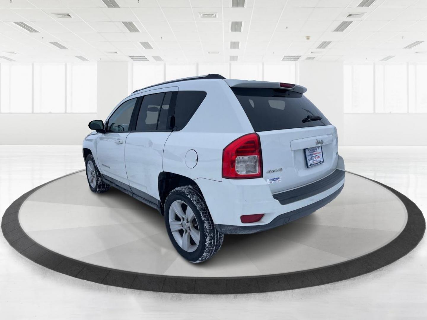 2013 Jeep Compass Latitude (1C4NJDEB3DD) with an Other engine, located at 1230 East Main St, Xenia, OH, 45385, (937) 908-9800, 39.688026, -83.910172 - 2013 Jeep Compass Latitude - Photo#4