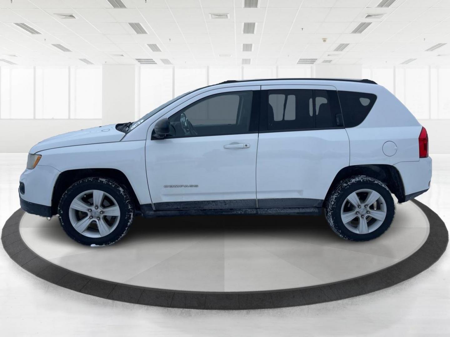 2013 Jeep Compass Latitude (1C4NJDEB3DD) with an Other engine, located at 1230 East Main St, Xenia, OH, 45385, (937) 908-9800, 39.688026, -83.910172 - 2013 Jeep Compass Latitude - Photo#5