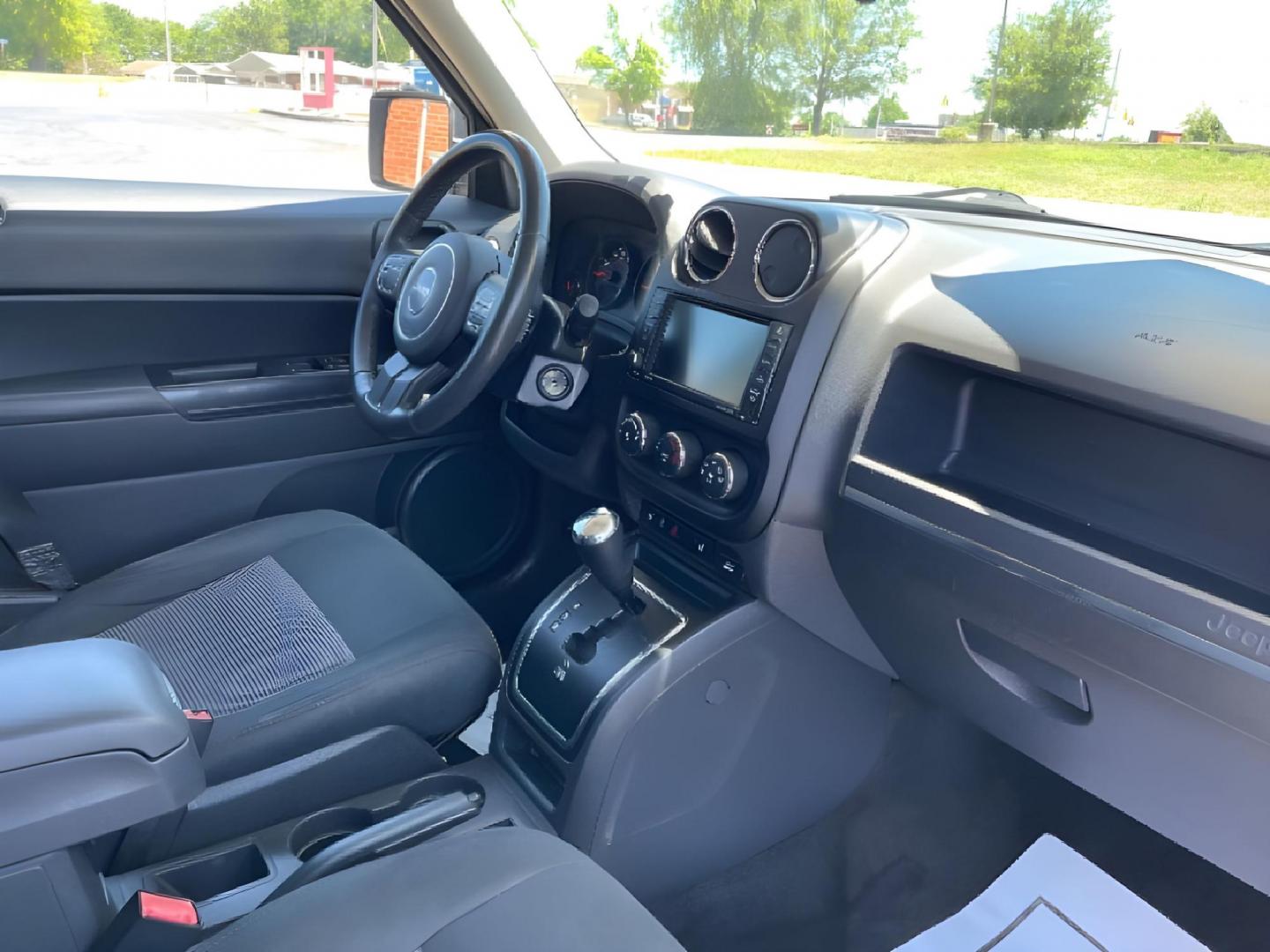 2013 Bright Silver Metallic Jeep Patriot Latitude 2WD (1C4NJPFBXDD) with an 2.4L L4 DOHC 16V engine, located at 1184 Kauffman Ave, Fairborn, OH, 45324, (937) 908-9800, 39.807072, -84.030914 - Photo#8