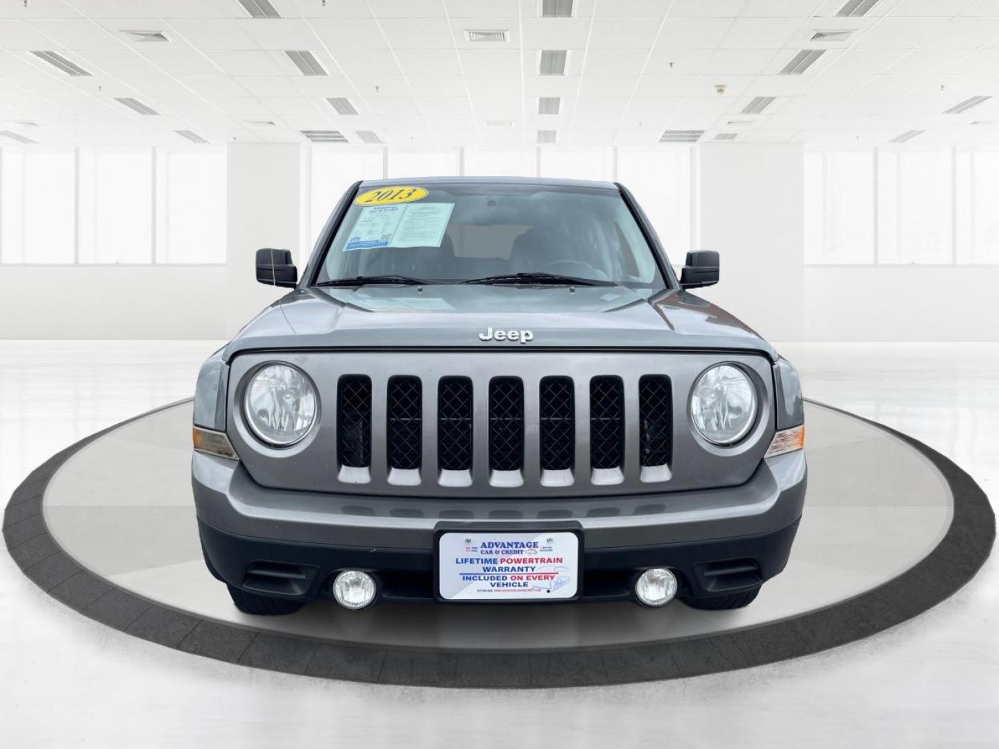 2013 Mineral Gray Metallic Jeep Patriot Latitude 4WD (1C4NJRFB5DD) with an 2.4L L4 DOHC 16V engine, located at 1951 S Dayton Lakeview Rd., New Carlisle, OH, 45344, (937) 908-9800, 39.890999, -84.050255 - Photo#6