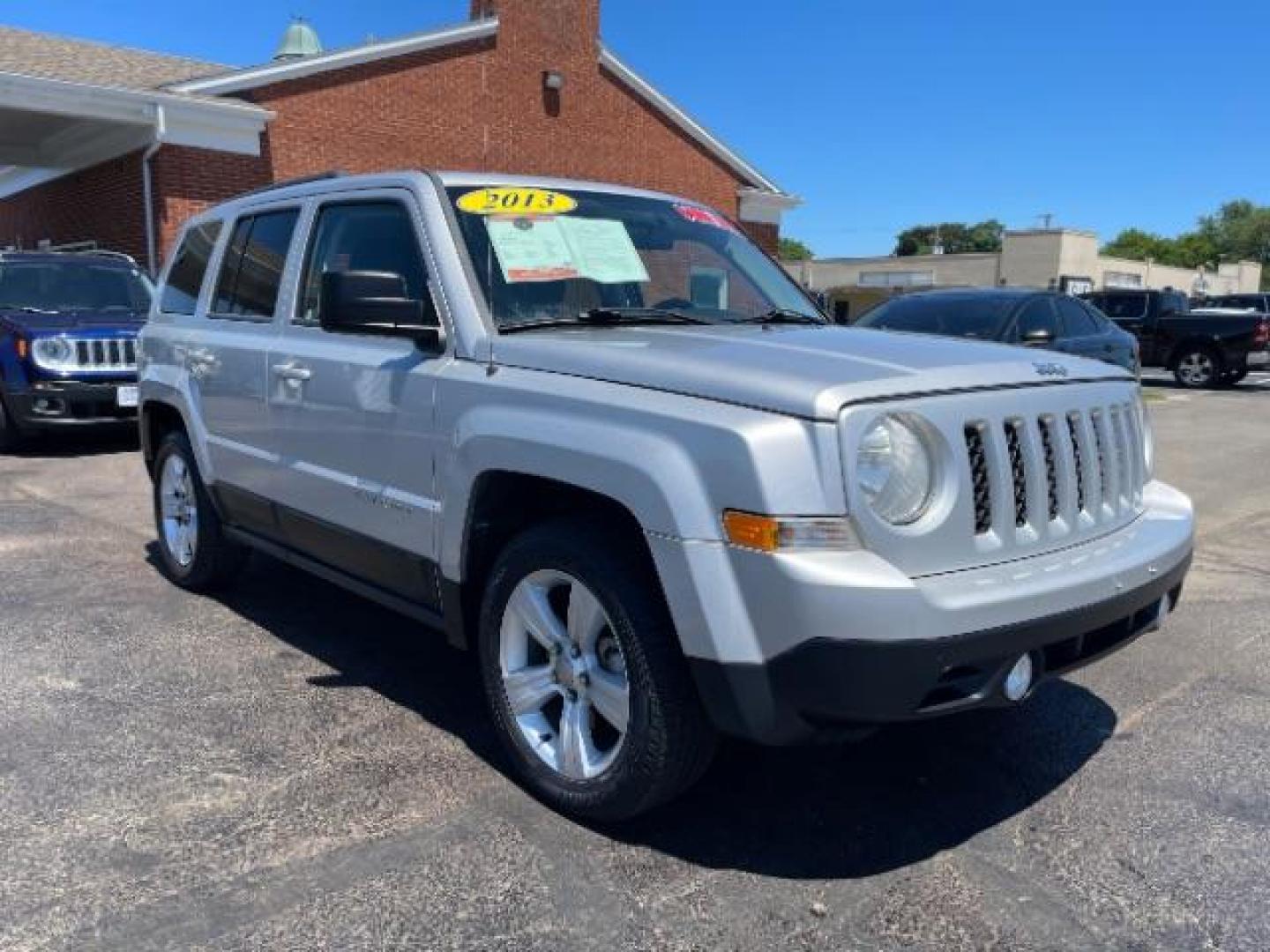 2013 Bright Silver Metallic Jeep Patriot Latitude 2WD (1C4NJPFBXDD) with an 2.4L L4 DOHC 16V engine, located at 1951 S Dayton Lakeview Rd., New Carlisle, OH, 45344, (937) 908-9800, 39.890999, -84.050255 - 2013 Jeep Patriot Latitude 2WD - Photo#13