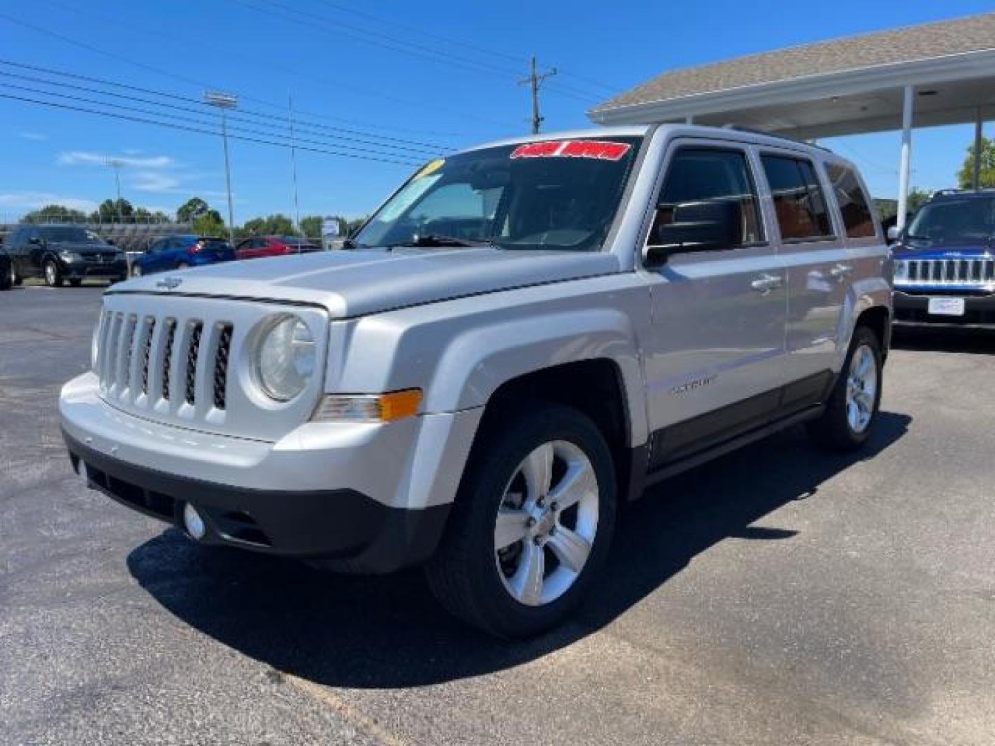 2013 Bright Silver Metallic Jeep Patriot Latitude 2WD (1C4NJPFBXDD) with an 2.4L L4 DOHC 16V engine, located at 1951 S Dayton Lakeview Rd., New Carlisle, OH, 45344, (937) 908-9800, 39.890999, -84.050255 - 2013 Jeep Patriot Latitude 2WD - Photo#14