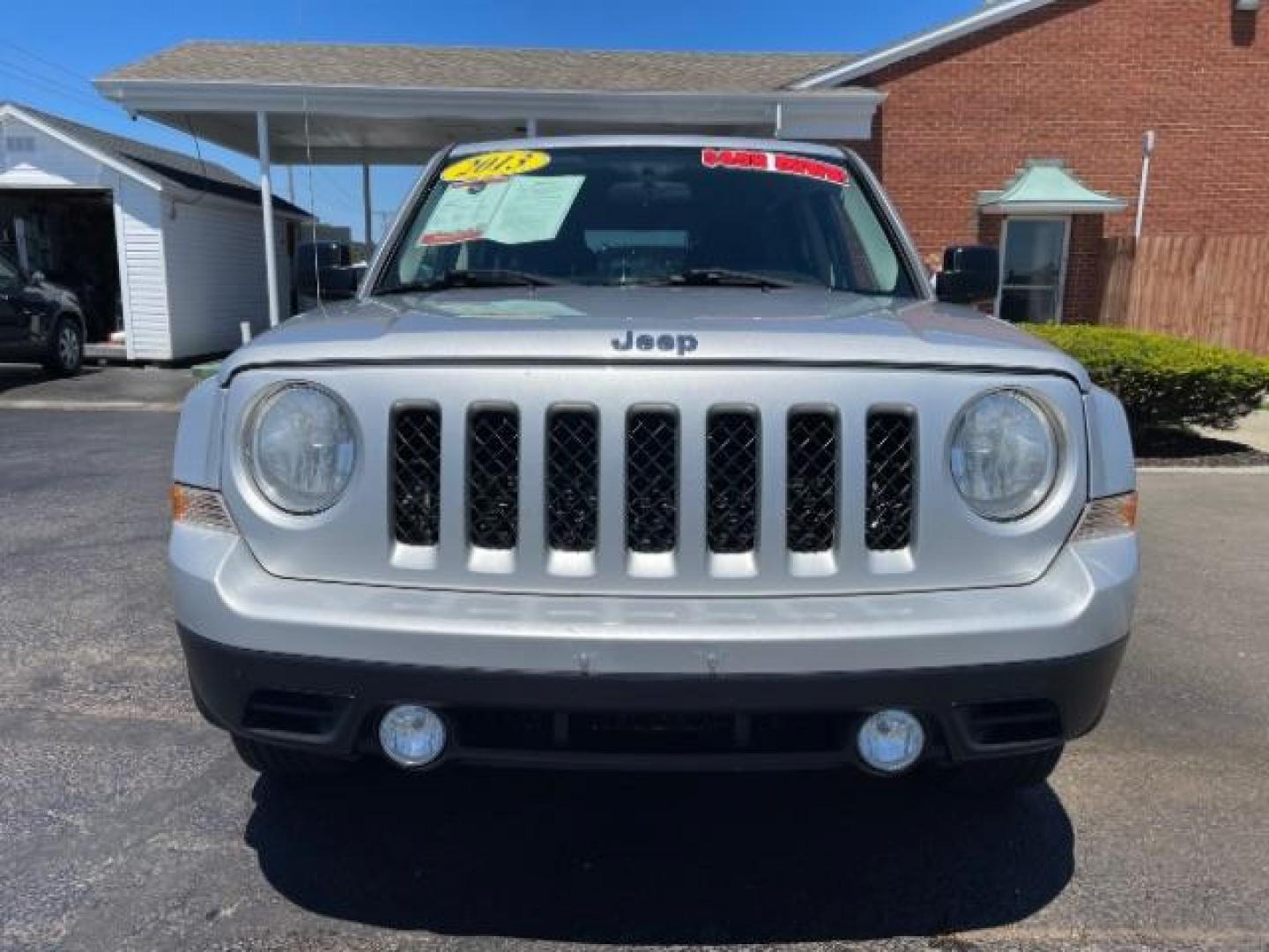 2013 Bright Silver Metallic Jeep Patriot Latitude 2WD (1C4NJPFBXDD) with an 2.4L L4 DOHC 16V engine, located at 1951 S Dayton Lakeview Rd., New Carlisle, OH, 45344, (937) 908-9800, 39.890999, -84.050255 - 2013 Jeep Patriot Latitude 2WD - Photo#17