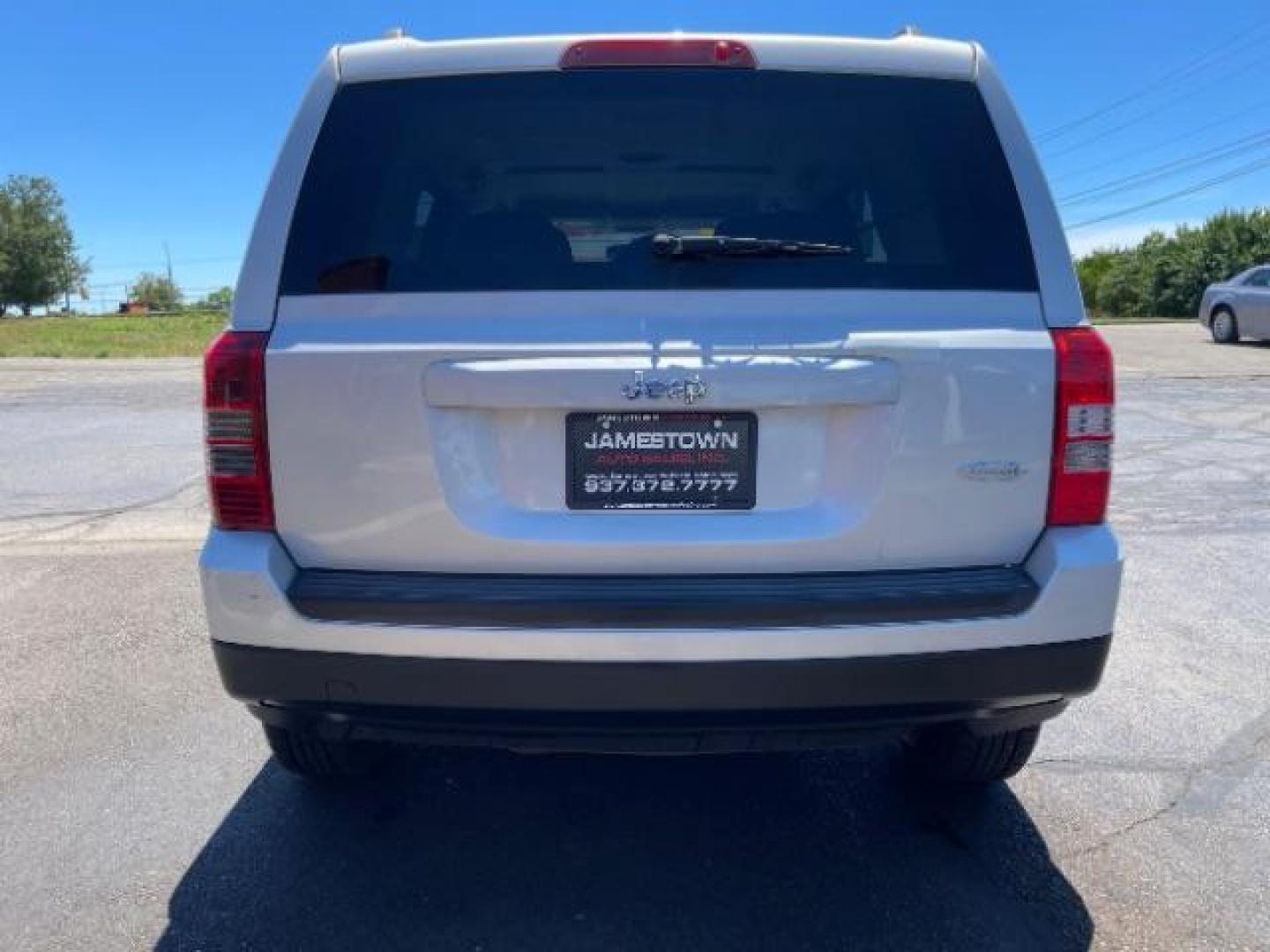 2013 Bright Silver Metallic Jeep Patriot Latitude 2WD (1C4NJPFBXDD) with an 2.4L L4 DOHC 16V engine, located at 1951 S Dayton Lakeview Rd., New Carlisle, OH, 45344, (937) 908-9800, 39.890999, -84.050255 - 2013 Jeep Patriot Latitude 2WD - Photo#18