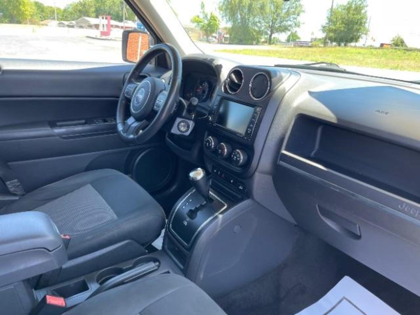 2013 Bright Silver Metallic Jeep Patriot Latitude 2WD (1C4NJPFBXDD) with an 2.4L L4 DOHC 16V engine, located at 1951 S Dayton Lakeview Rd., New Carlisle, OH, 45344, (937) 908-9800, 39.890999, -84.050255 - 2013 Jeep Patriot Latitude 2WD - Photo#21