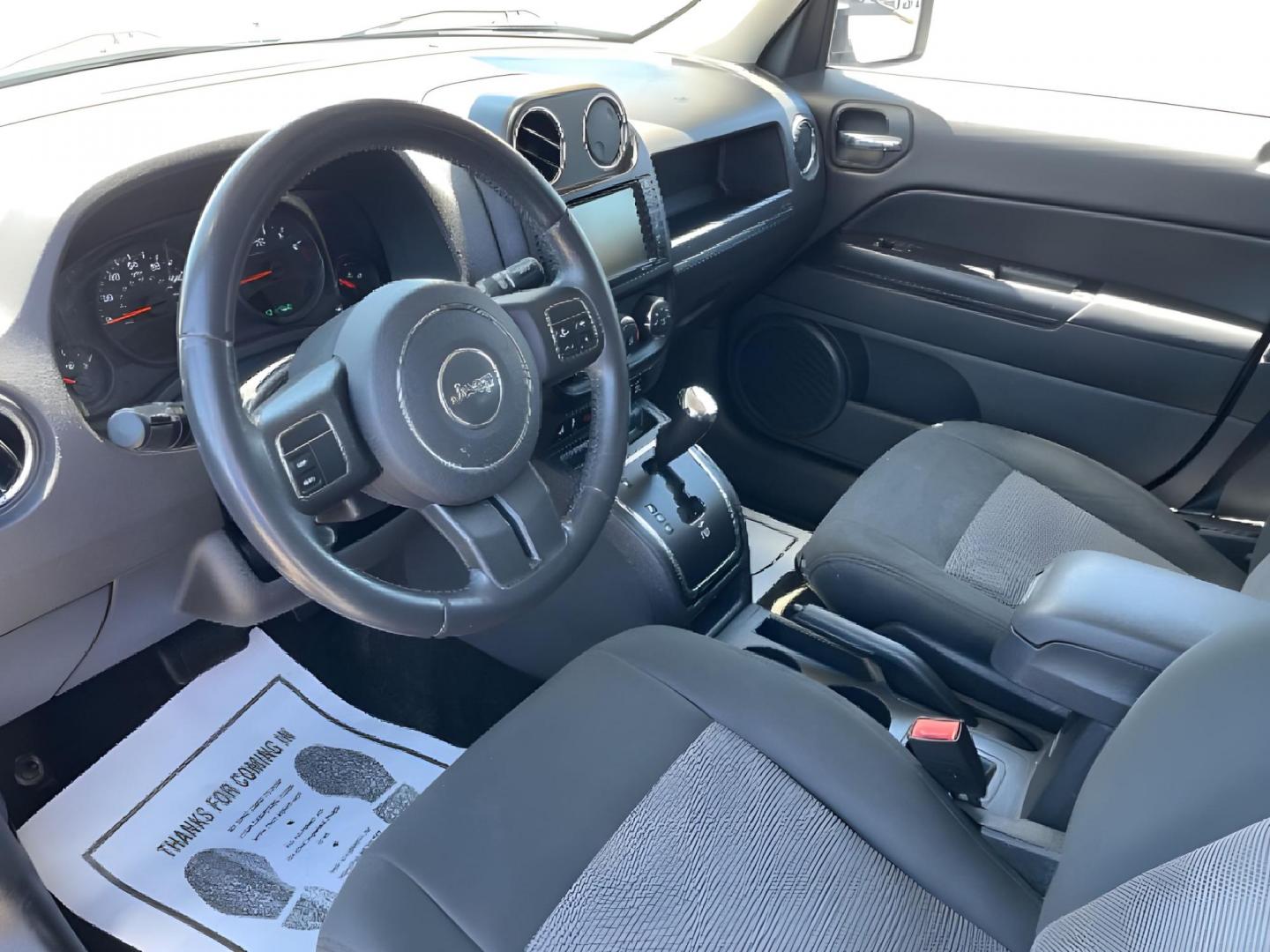 2013 Bright Silver Metallic Jeep Patriot Latitude 2WD (1C4NJPFBXDD) with an 2.4L L4 DOHC 16V engine, located at 1951 S Dayton Lakeview Rd., New Carlisle, OH, 45344, (937) 908-9800, 39.890999, -84.050255 - 2013 Jeep Patriot Latitude 2WD - Photo#6