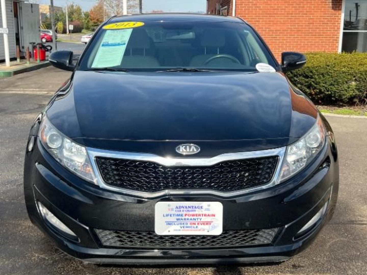 2013 Ebony Black Kia Optima LX AT (5XXGM4A7XDG) with an 2.4L L4 DOHC 16V engine, 6-Speed Automatic transmission, located at 1951 S Dayton Lakeview Rd., New Carlisle, OH, 45344, (937) 908-9800, 39.890999, -84.050255 - Photo#1