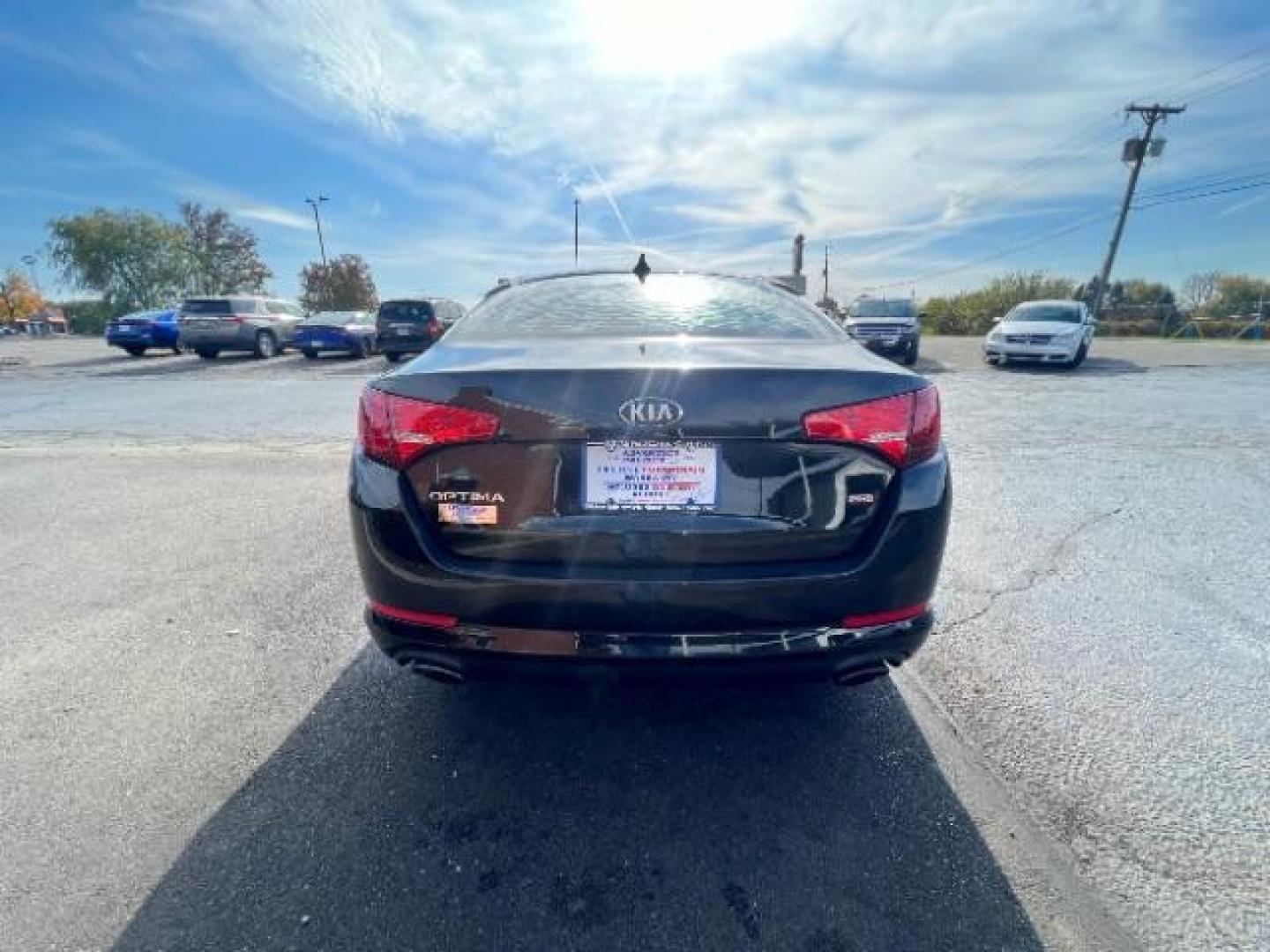 2013 Ebony Black Kia Optima LX AT (5XXGM4A7XDG) with an 2.4L L4 DOHC 16V engine, 6-Speed Automatic transmission, located at 1951 S Dayton Lakeview Rd., New Carlisle, OH, 45344, (937) 908-9800, 39.890999, -84.050255 - Photo#4