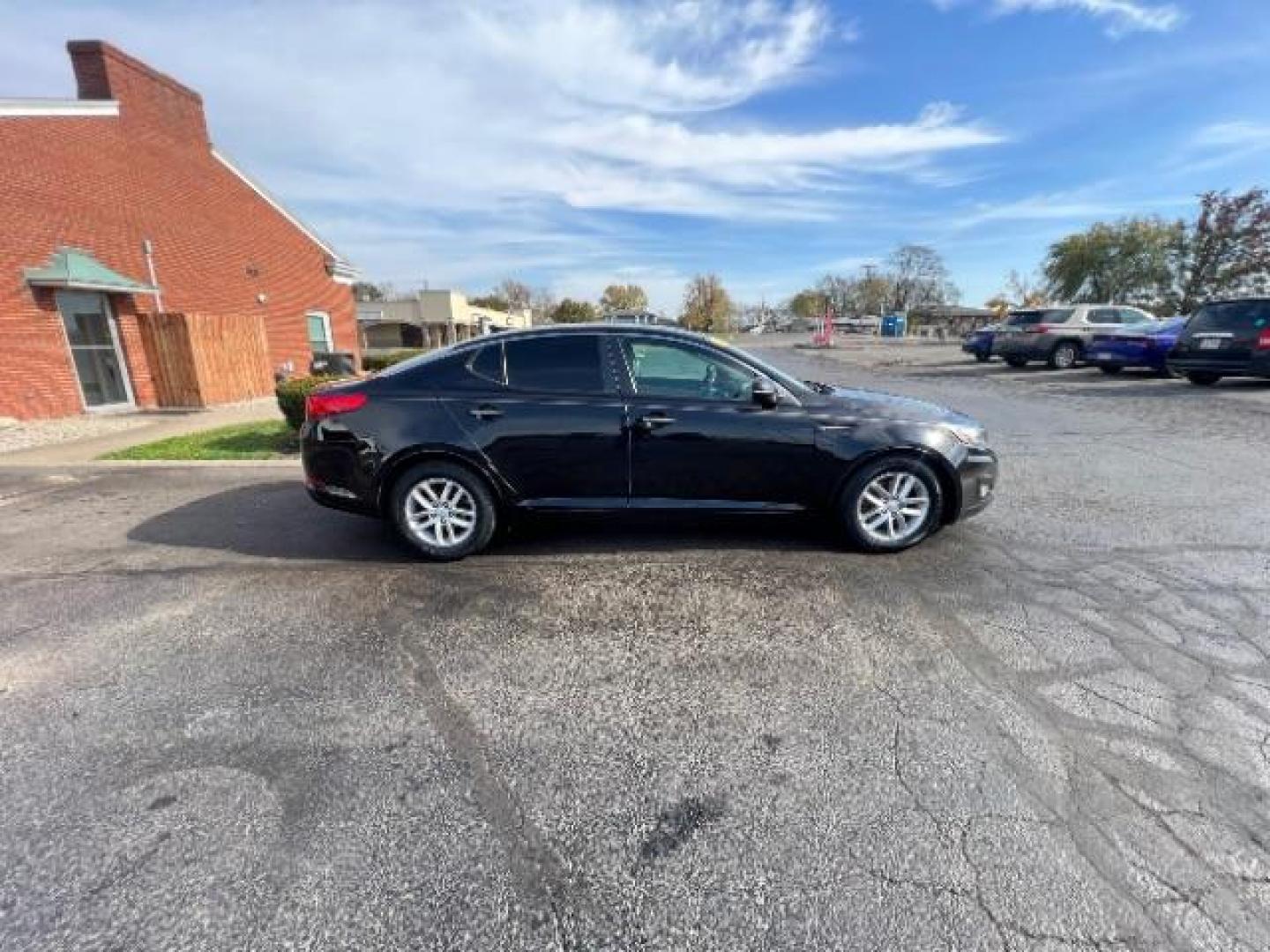 2013 Ebony Black Kia Optima LX AT (5XXGM4A7XDG) with an 2.4L L4 DOHC 16V engine, 6-Speed Automatic transmission, located at 1951 S Dayton Lakeview Rd., New Carlisle, OH, 45344, (937) 908-9800, 39.890999, -84.050255 - Photo#5