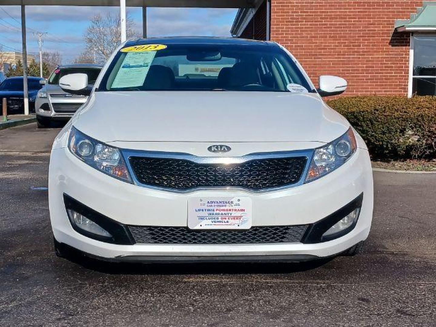 2013 Snow White Pearl Kia Optima EX (5XXGN4A7XDG) with an 2.4L L4 DOHC 16V engine, 6-Speed Automatic transmission, located at 401 Woodman Dr, Riverside, OH, 45431, (937) 908-9800, 39.760899, -84.123421 - Photo#1