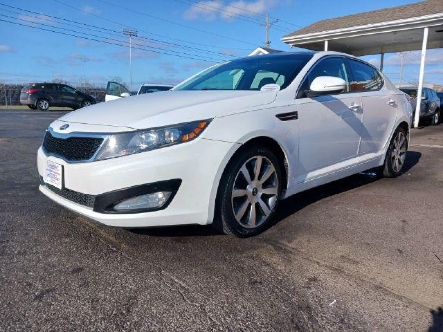 2013 Snow White Pearl Kia Optima EX (5XXGN4A7XDG) with an 2.4L L4 DOHC 16V engine, 6-Speed Automatic transmission, located at 401 Woodman Dr, Riverside, OH, 45431, (937) 908-9800, 39.760899, -84.123421 - Photo#2