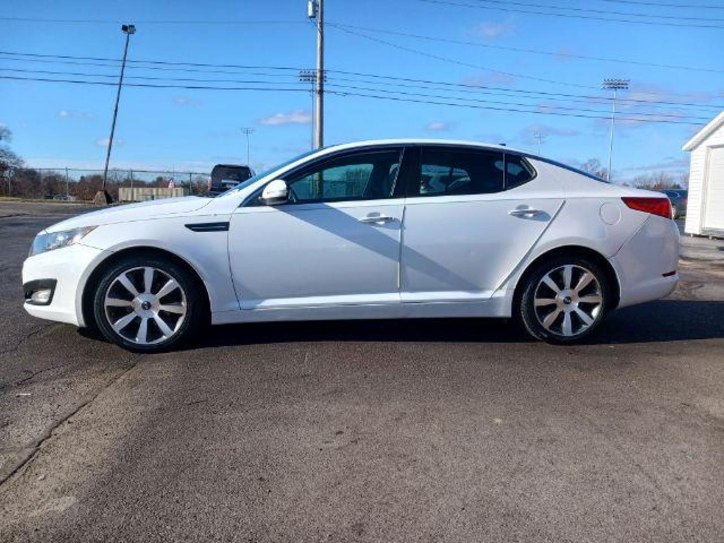 2013 Snow White Pearl Kia Optima EX (5XXGN4A7XDG) with an 2.4L L4 DOHC 16V engine, 6-Speed Automatic transmission, located at 401 Woodman Dr, Riverside, OH, 45431, (937) 908-9800, 39.760899, -84.123421 - Photo#3