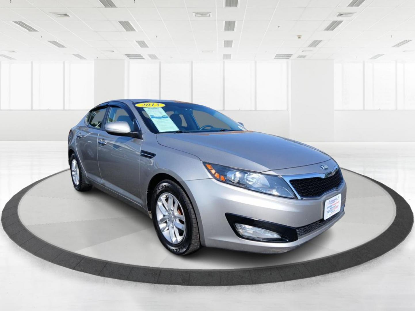 2013 Satin Metal Metallic Kia Optima LX MT (5XXGM4A71DG) with an 2.4L L4 DOHC 16V engine, 5-Speed Manual transmission, located at 4508 South Dixie Dr, Moraine, OH, 45439, (937) 908-9800, 39.689976, -84.218452 - Photo#0