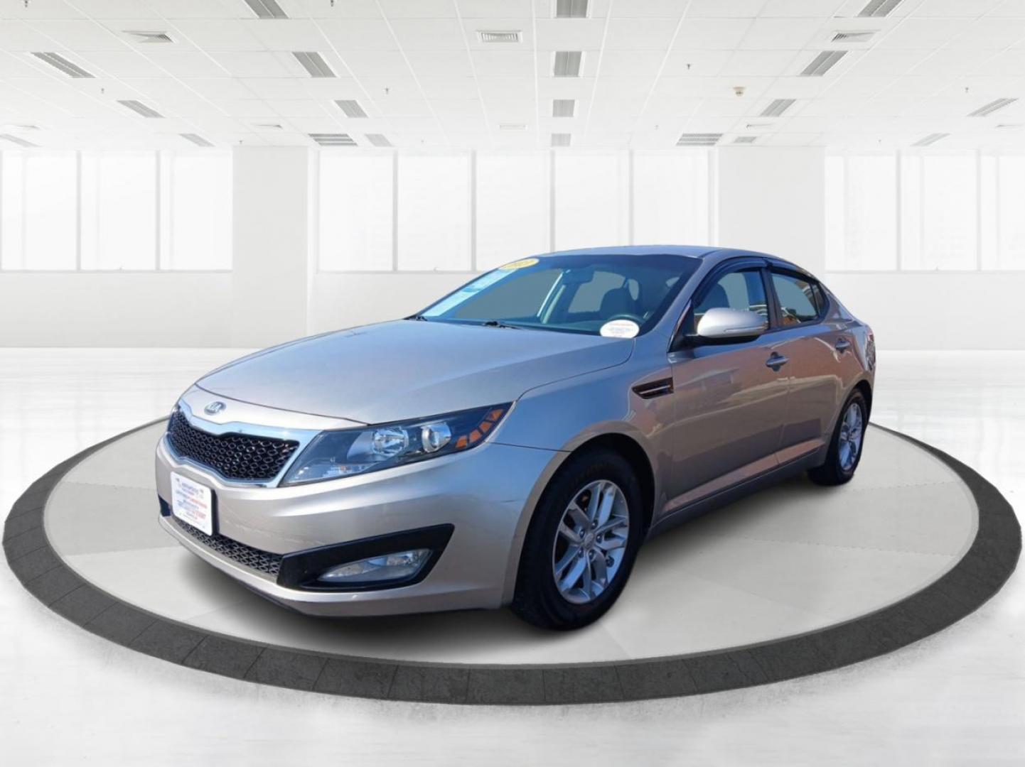 2013 Satin Metal Metallic Kia Optima LX MT (5XXGM4A71DG) with an 2.4L L4 DOHC 16V engine, 5-Speed Manual transmission, located at 4508 South Dixie Dr, Moraine, OH, 45439, (937) 908-9800, 39.689976, -84.218452 - Photo#7