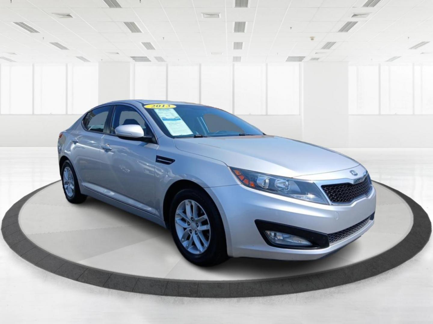 2013 Bright Silver Metallic Kia Optima LX AT (KNAGM4A78D5) with an 2.4L L4 DOHC 16V engine, 6-Speed Automatic transmission, located at 1099 N County Rd 25A , Troy, OH, 45373, (937) 908-9800, 40.057079, -84.212883 - Photo#0