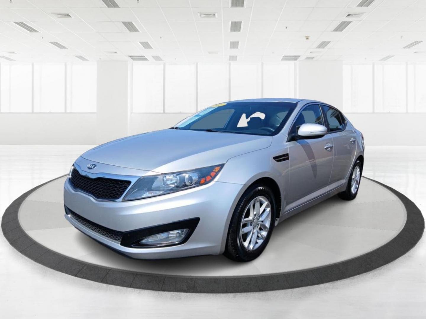 2013 Bright Silver Metallic Kia Optima LX AT (KNAGM4A78D5) with an 2.4L L4 DOHC 16V engine, 6-Speed Automatic transmission, located at 1099 N County Rd 25A , Troy, OH, 45373, (937) 908-9800, 40.057079, -84.212883 - Photo#7