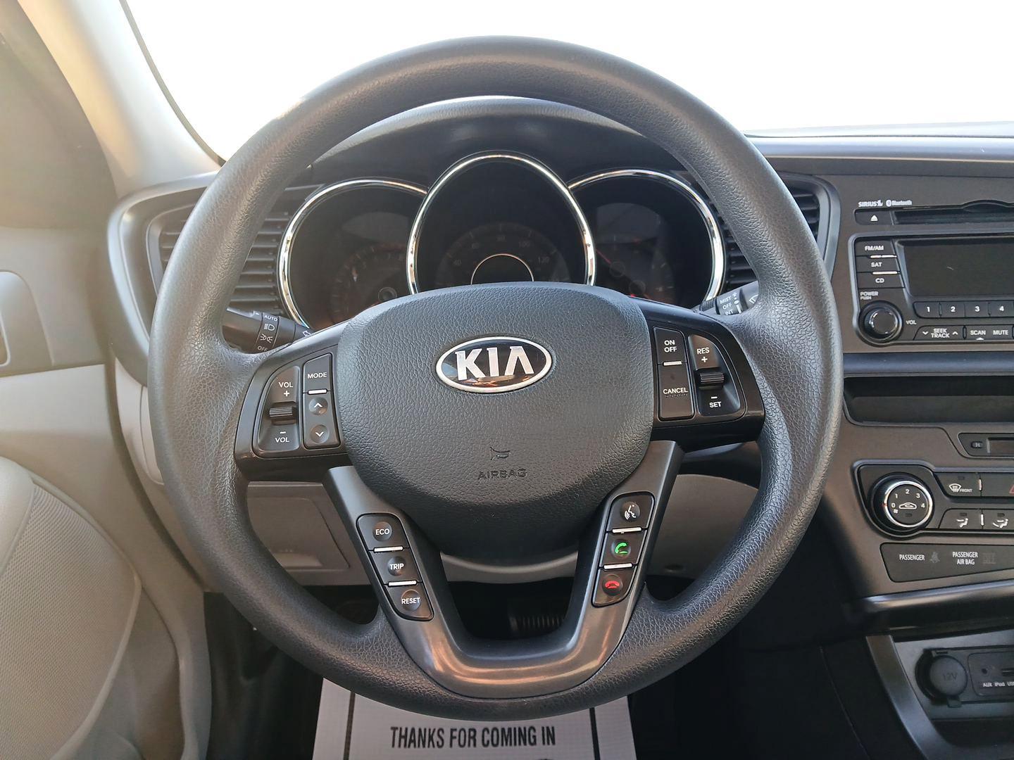 2013 Titanium Metallic Kia Optima LX MT (KNAGM4A76D5) with an 2.4L L4 DOHC 16V engine, 6-Speed Manual transmission, located at 1099 N County Rd 25A , Troy, OH, 45373, (937) 908-9800, 40.057079, -84.212883 - Photo#15