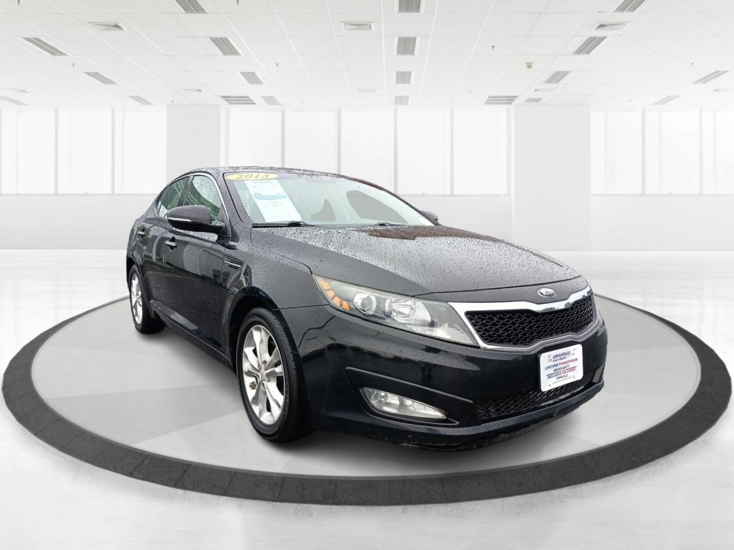 2013 Aurora Black Kia Optima (5XXGN4A7XDG) with an 2.4L L4 DOHC 16V engine, 6-Speed Automatic transmission, located at 880 E. National Road, Vandalia, OH, 45377, (937) 908-9800, 39.891918, -84.183594 - Photo#0