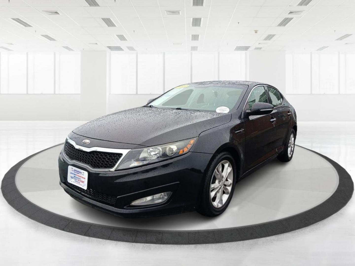 2013 Aurora Black Kia Optima (5XXGN4A7XDG) with an 2.4L L4 DOHC 16V engine, 6-Speed Automatic transmission, located at 880 E. National Road, Vandalia, OH, 45377, (937) 908-9800, 39.891918, -84.183594 - Photo#7