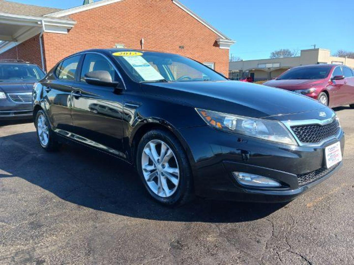 2013 Ebony Black Kia Optima LX AT (5XXGM4A73DG) with an 2.4L L4 DOHC 16V engine, 6-Speed Automatic transmission, located at 1230 East Main St, Xenia, OH, 45385, (937) 908-9800, 39.688026, -83.910172 - Photo#0