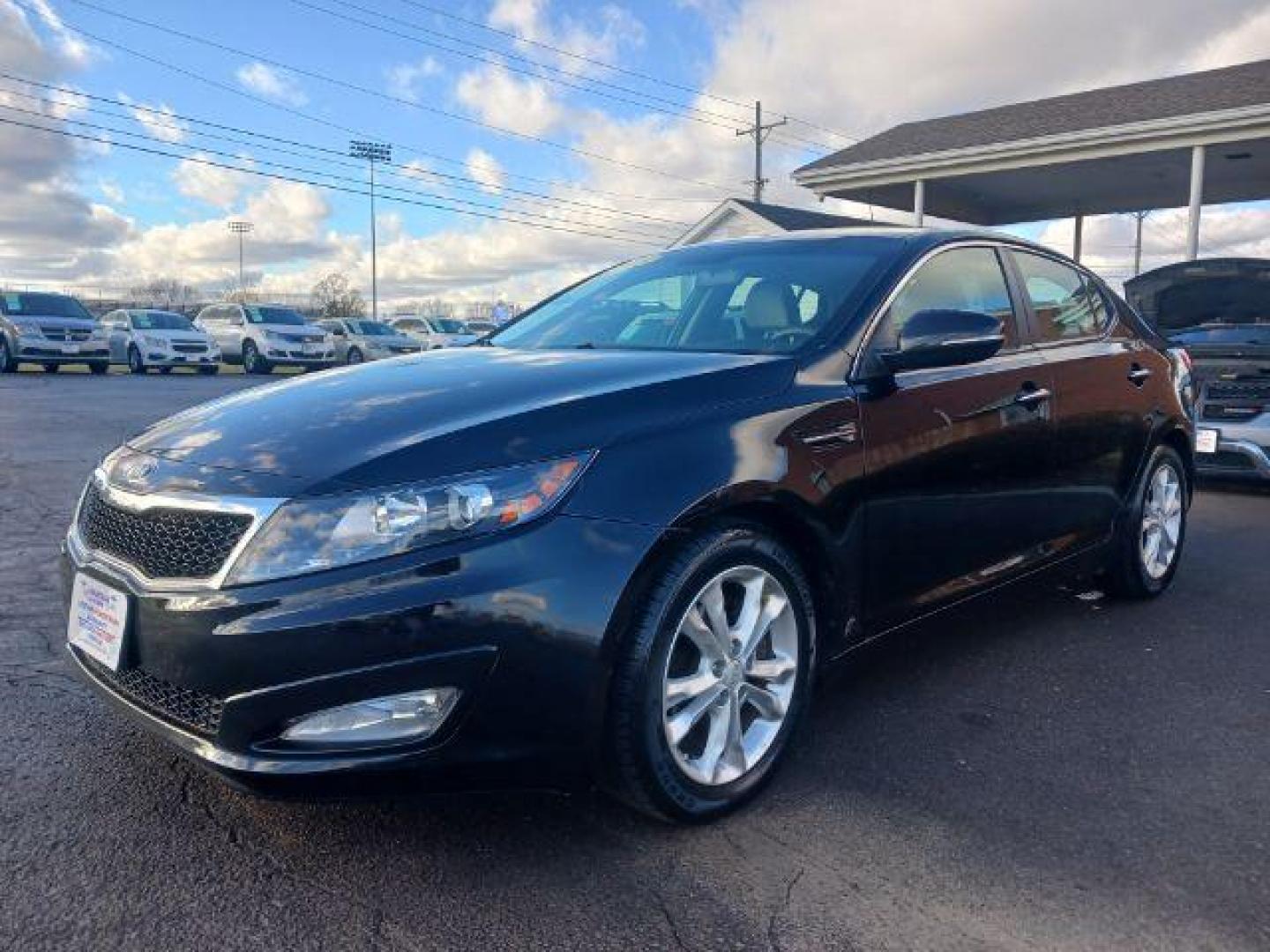 2013 Ebony Black Kia Optima LX AT (5XXGM4A73DG) with an 2.4L L4 DOHC 16V engine, 6-Speed Automatic transmission, located at 1230 East Main St, Xenia, OH, 45385, (937) 908-9800, 39.688026, -83.910172 - Photo#2