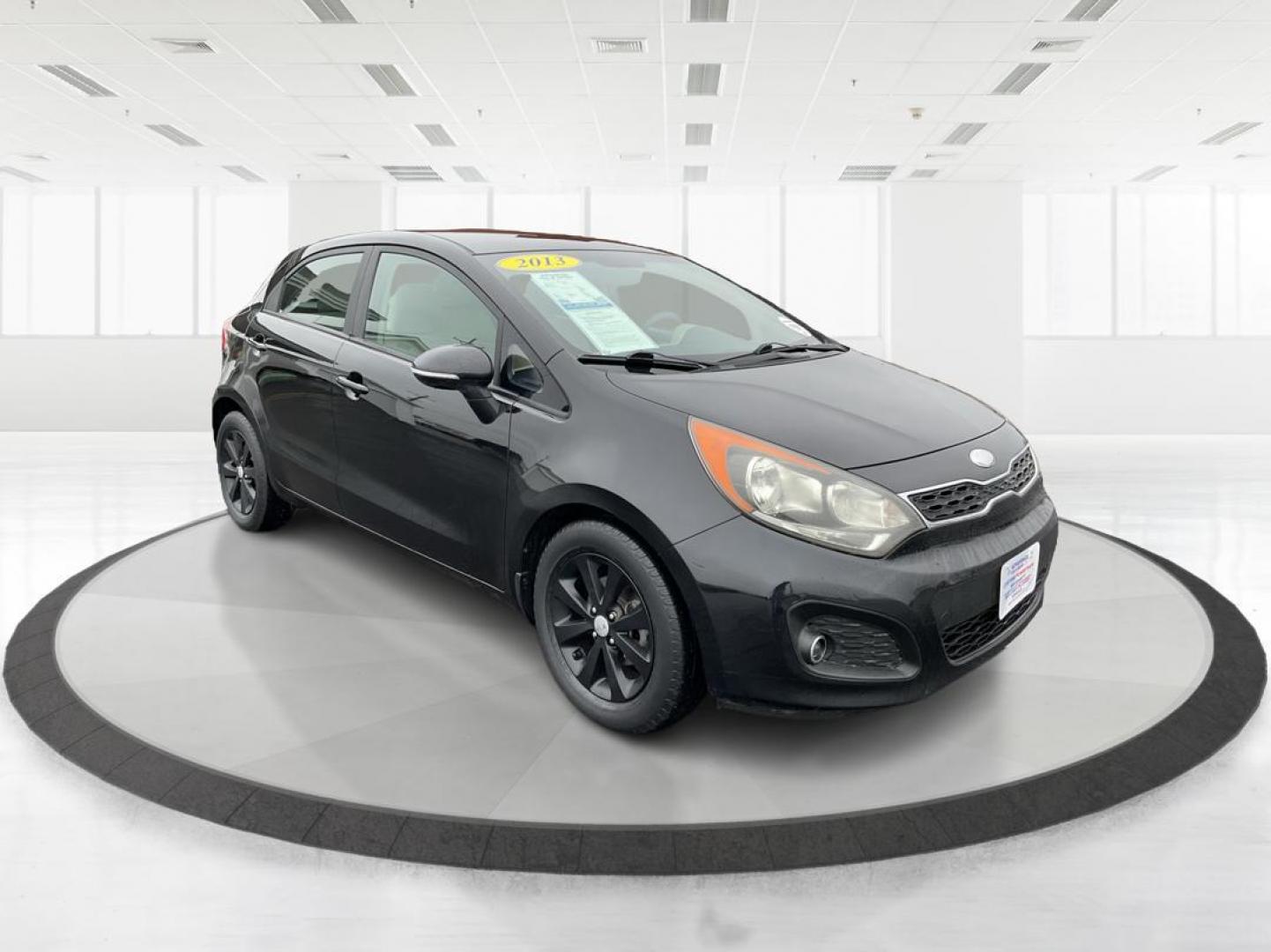 2013 Kia Rio EX (KNADN5A30D6) with an 1.6L I-4 gasoline direct injection engine, located at 880 E. National Road, Vandalia, OH, 45377, (937) 908-9800, 39.891918, -84.183594 - Photo#0