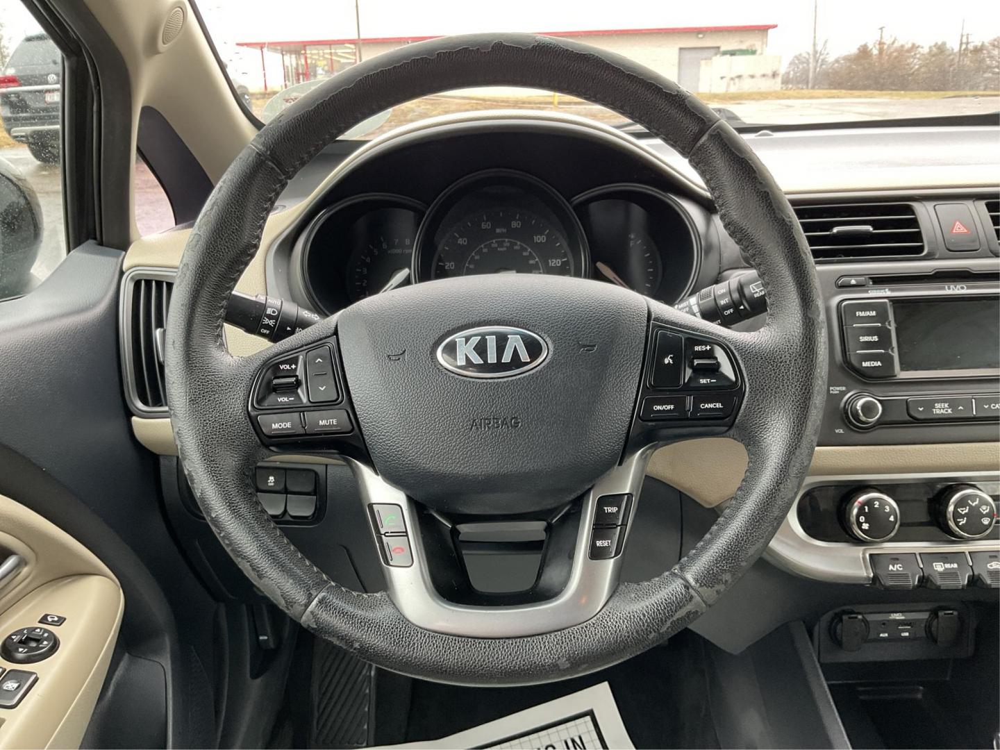 2013 Kia Rio EX (KNADN5A30D6) with an 1.6L I-4 gasoline direct injection engine, located at 880 E. National Road, Vandalia, OH, 45377, (937) 908-9800, 39.891918, -84.183594 - Photo#15