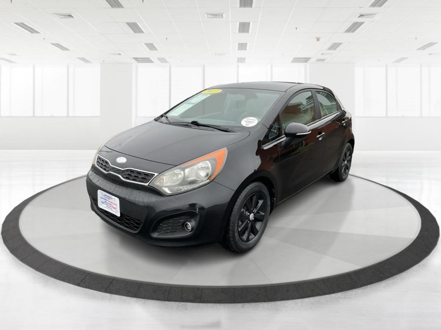 2013 Kia Rio EX (KNADN5A30D6) with an 1.6L I-4 gasoline direct injection engine, located at 880 E. National Road, Vandalia, OH, 45377, (937) 908-9800, 39.891918, -84.183594 - Photo#7