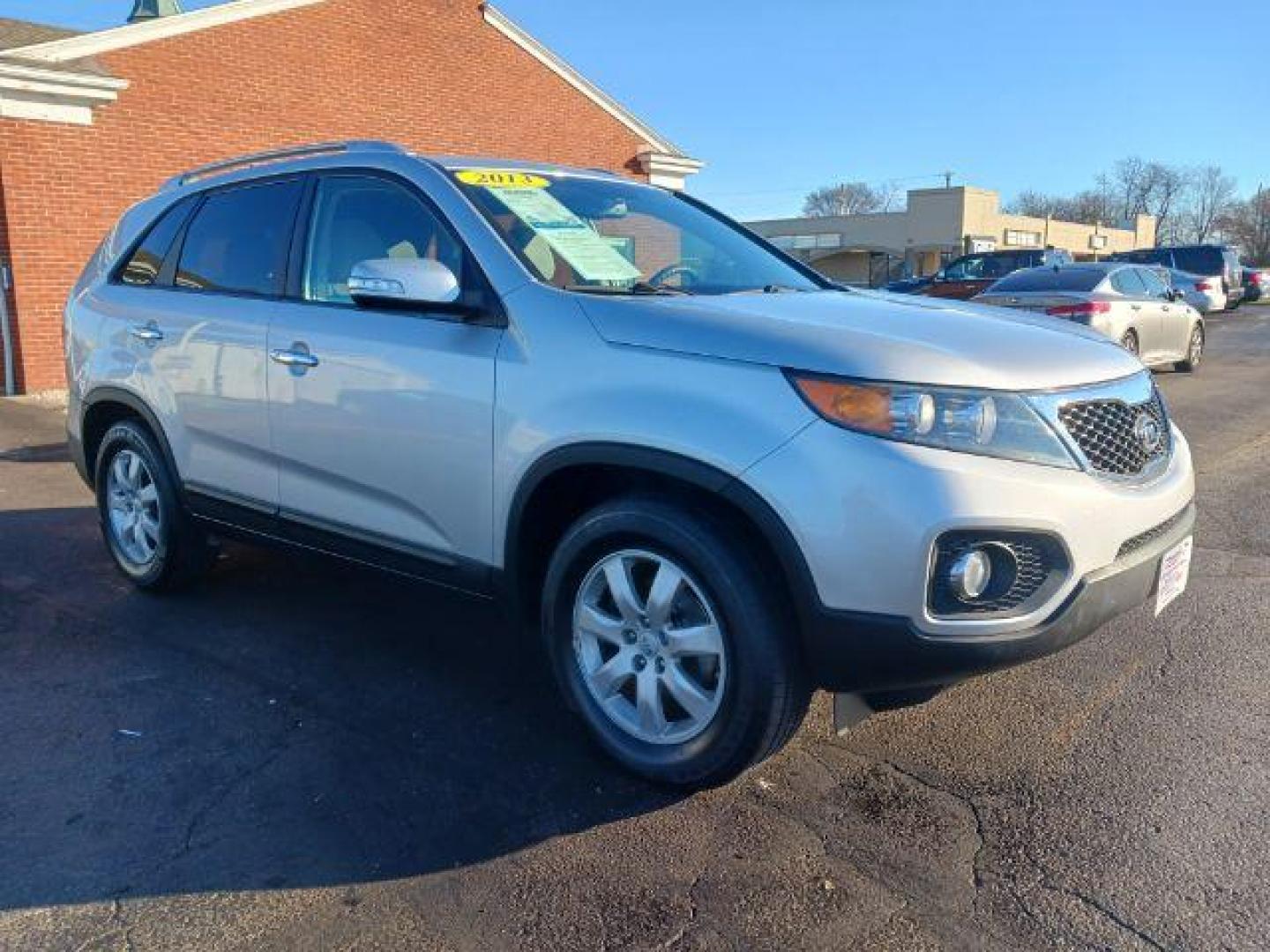 2013 Titanium Silver Kia Sorento LX 2WD (5XYKT3A66DG) with an 2.4L L4 DOHC 16V engine, 6-Speed Automatic transmission, located at 1099 N County Rd 25A , Troy, OH, 45373, (937) 908-9800, 40.057079, -84.212883 - Photo#0